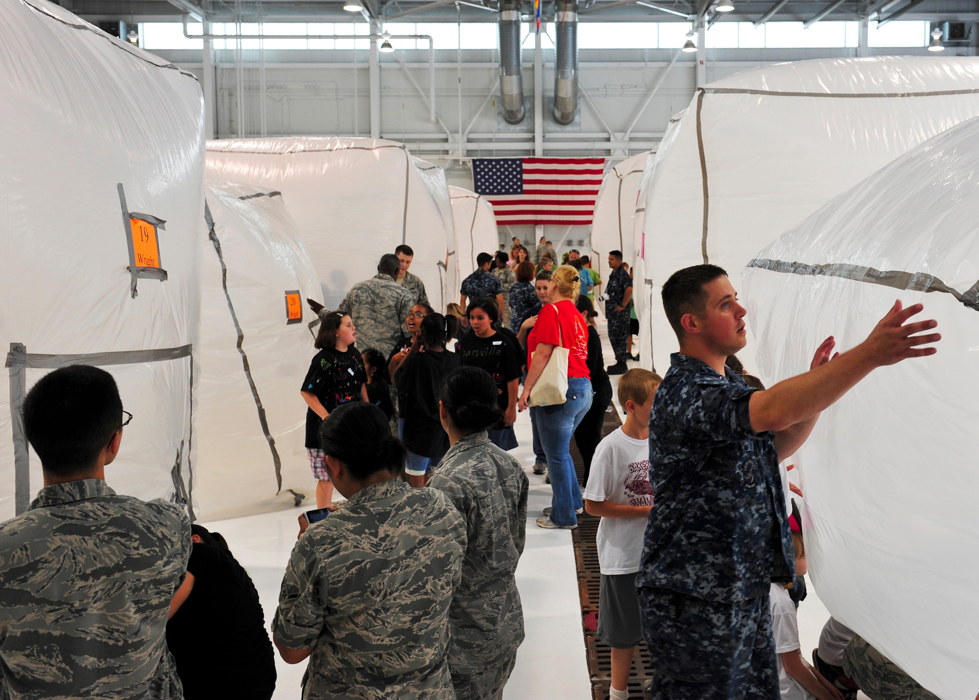 Mars habitats fill a 33rd Fighter Wing hangar May 4 at Eglin Air Force Base, Fla.  More than 100 military volunteers assisted more than 450 students from Lewis, Longwood, Wright, Baker and Eglin Elementary Schools construct habitats during the 17th annual Marsville program.  The experience is designed to inspire students to enter the highly demanding career fields of science, technology, engineering and math. (U.S. Air Force photo/Randy Gon)