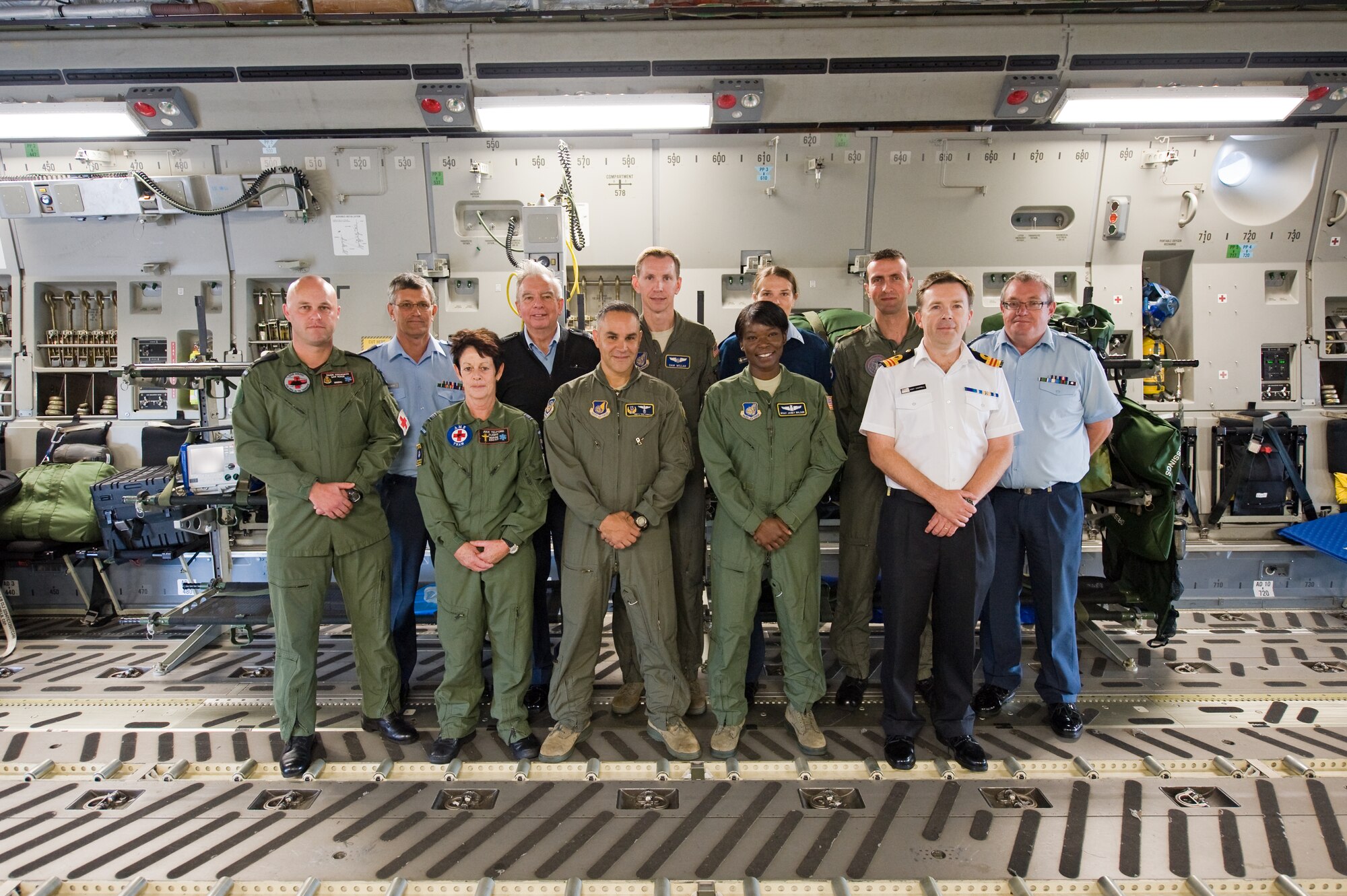 Aeromedical personnel from the U.S. Air Force and the Royal New Zealand Air Force gather on board a U.S. C-17 Globemaster III during a subject matter exchange conference at Phenuapai Air Base, New Zealand, in April 2012.  The conference allowed both Air Forces to discuss how each country conducts operations to ensure future engagements, either real world or training, are as effective as possible. This meeting was conducted because a seamless response does not happen automatically; it is the result of exchanges and training events that increase operations awareness between counterparts.  (U.S. Air Force photo/ Capt. Rebecca Heyse) 
