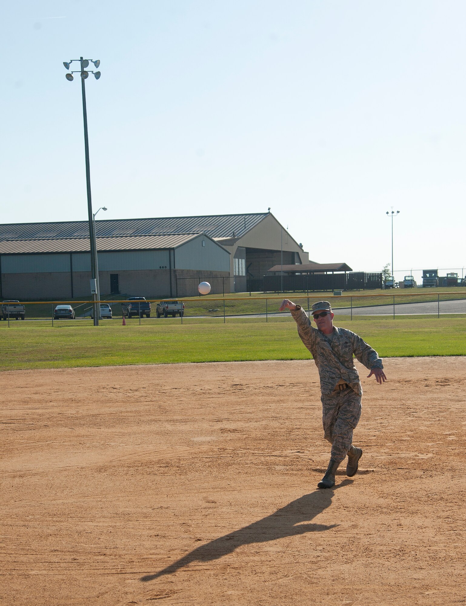 U.S Air Force Chief Master Sgt. Frank Batten, 23d Wing command chief throws the first pitch at the annual First Sergeants Association Spring Air Force JROTC softball tournament at Moody Air Force Base Ga., May 5th, 2012. The tournament was hosted by the First Sergeants and the Airmen Committed to Excellence committee and provided drinks and beverages. (U.S. Air Force photo by Airman 1st Class Paul Francis/Released)