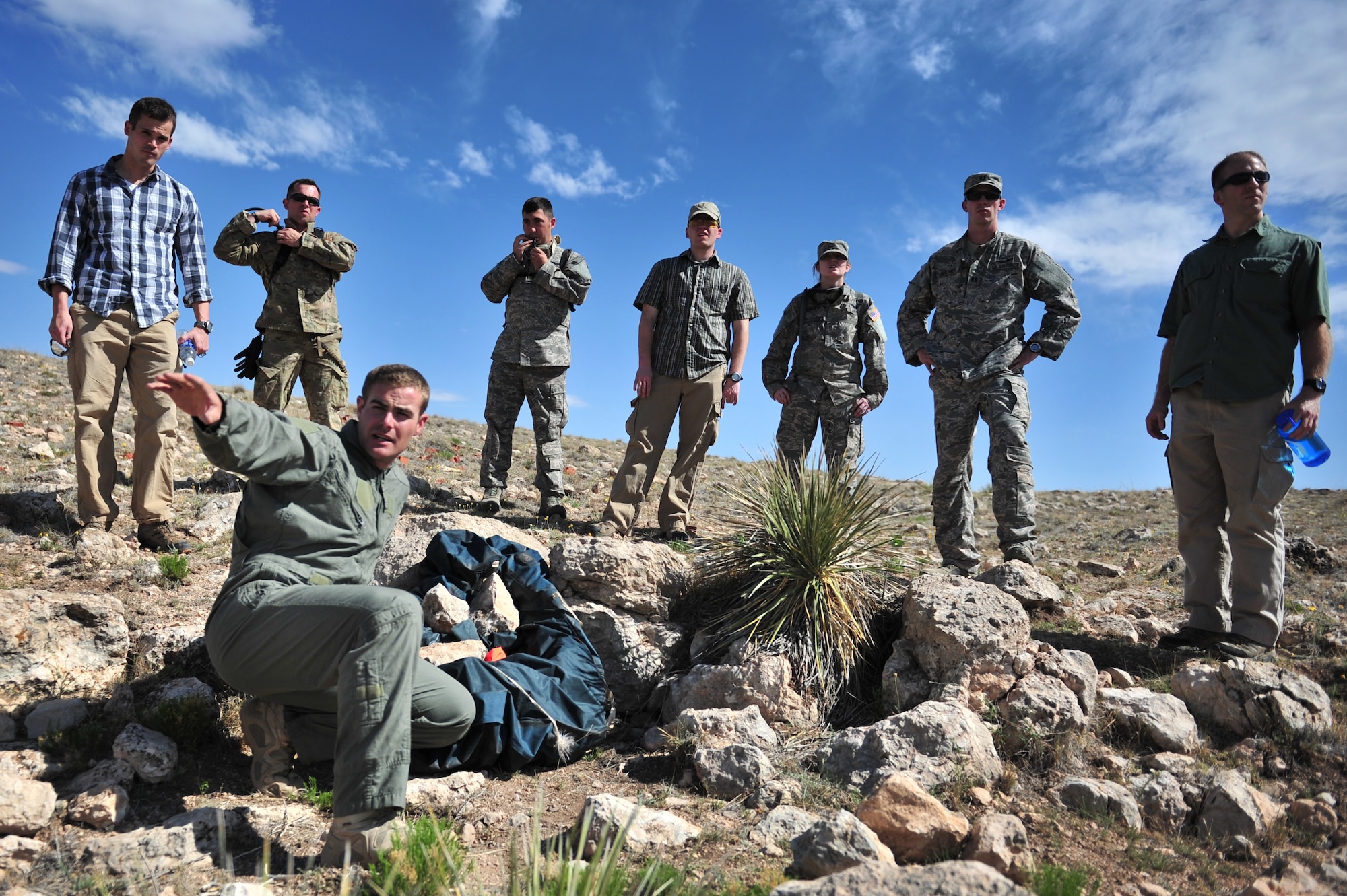 U.S. Air Force Staff Sgt. Adam Murphy, 27th Special Operations Support Squadron Survival Escape Resistance Evasion specialist, gives a lesson on terrain assessment during a field training course at Melrose Air Force Range, N.M., May 3, 2012. Aircrew members spent the day at the range learning critical SERE field training skills. (U.S. Air Force photo by Airman 1st Class Alexxis Pons Abascal)  