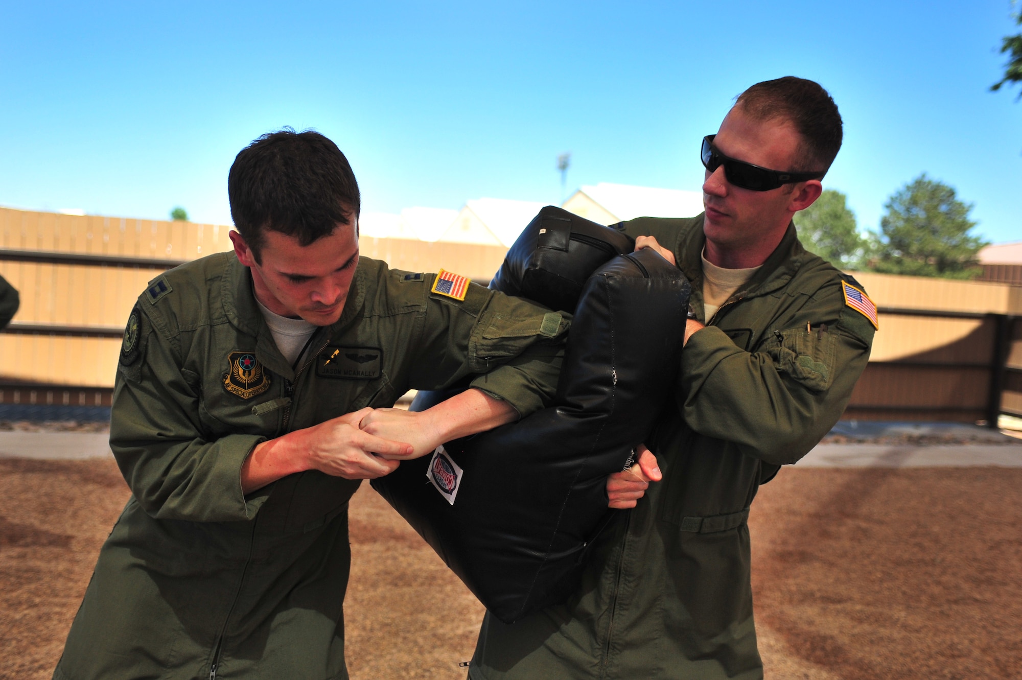 U.S. Air Force aircrew members practice sparring techniques on each other during a specialized Survival, Evasion, Resistance, and Escape lesson Cannon Air Force Base, N.M., May 2, 2012. SERE training is necessary for select Cannon Air Force Base, N.M., personnel to maintain mission-ready status. (U.S. Air Force photo by Airman 1st Class Alexxis Pons Abascal)  