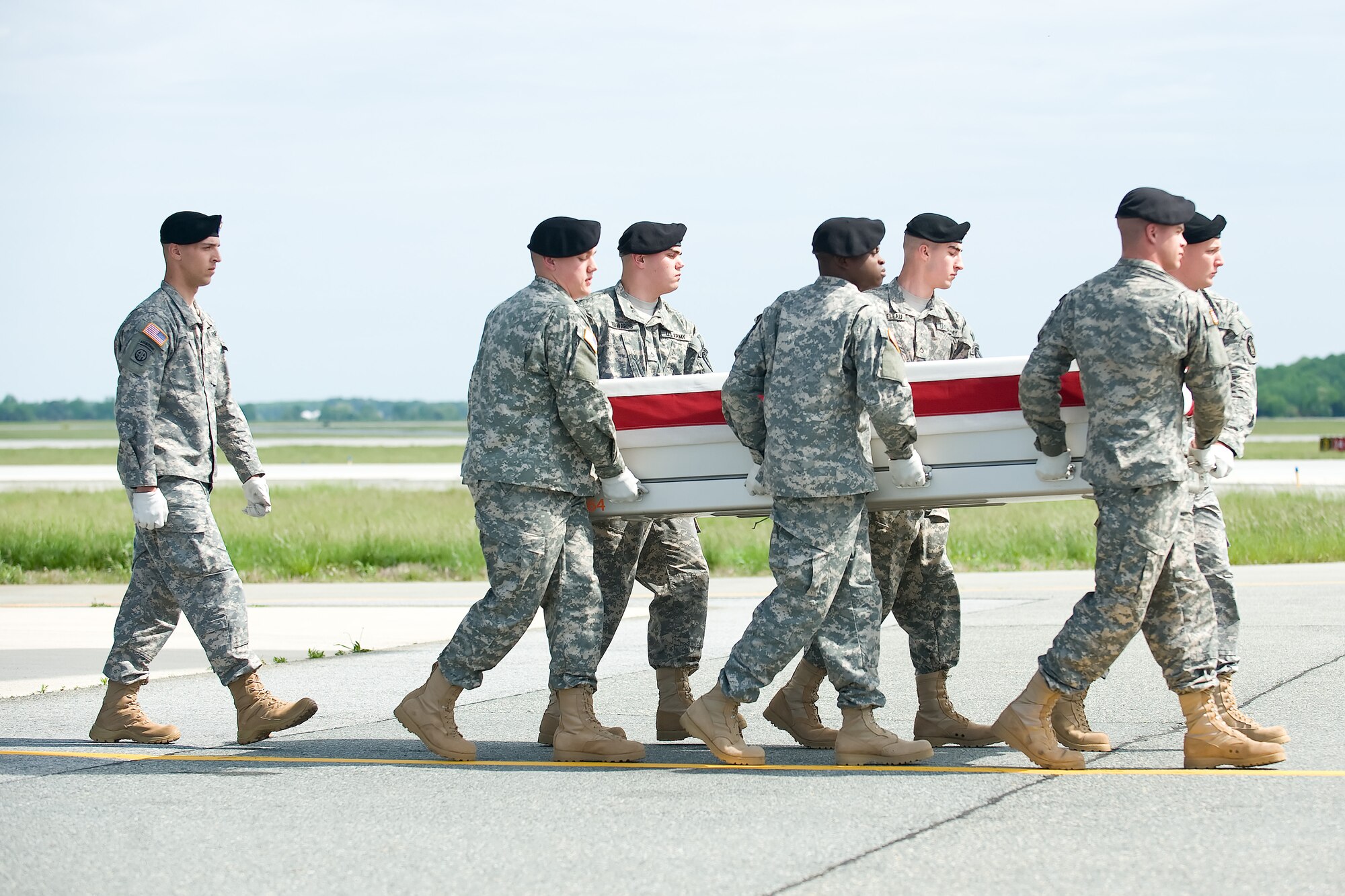 A U.S. Army carry team transfers the remains of Army Master Sgt. Gregory L. Childs of Warren, Ark., at Dover Air Force Base, Del., May 7, 2012. (U.S. Air Force photo/Adrian R. Rowan)