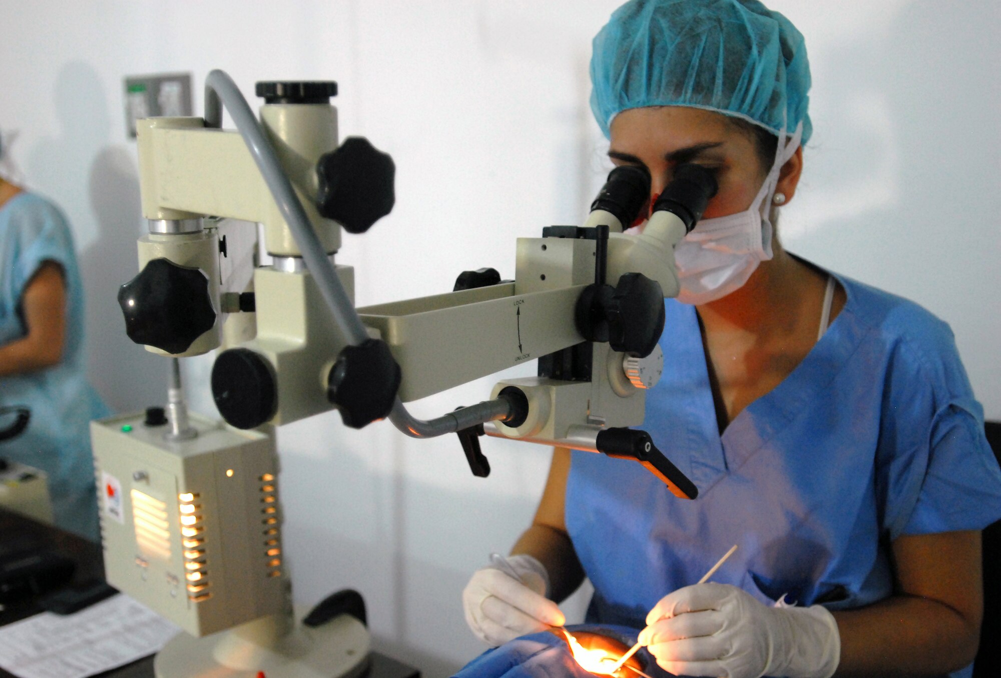 120427-A-WP252-005 – Dr. Catalina del Portillo, a volunteer ophthalmologist, prepares to conduct eye surgery on a person suffering from cataracts as part of a two-day Surgical Civic Action Program April 27-28 in the small town of La Macarena, Colombia, located 170 miles southeast of Bogota. Cataracts are an eye disease in which the clear lens of the eye becomes cloudy opaque, causing a decrease in vision (Department of Defense photo by Sgt. 1st Class Alex Licea, Special Operations Command South Public Affairs) (Contributing reporter for the U.S. Embassy in Bogota.)