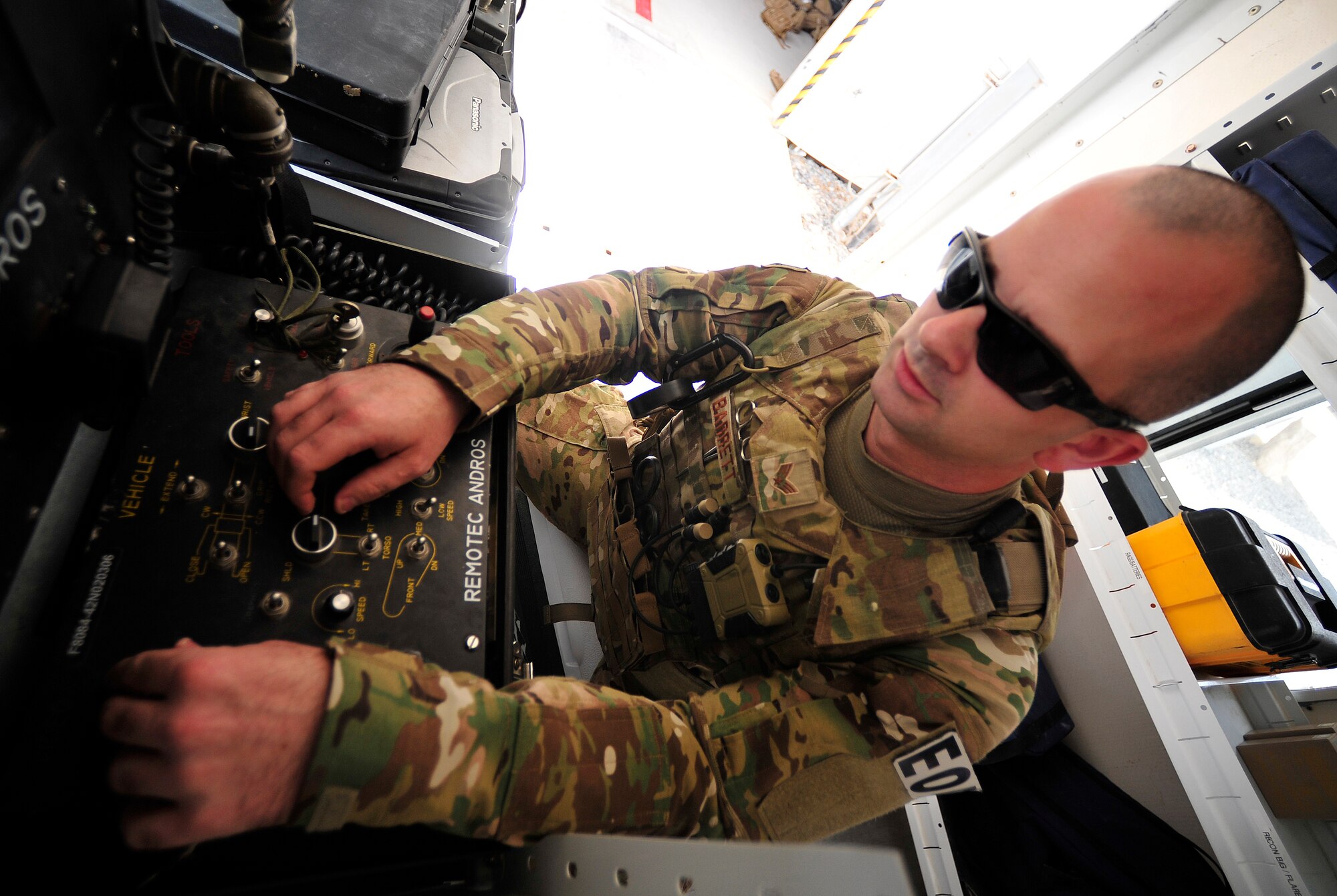 SOUTHWEST ASIA - U.S. Air Force Senior Airman John Barrett, 380th Expeditionary Civil Engineer Squadron Explosive Ordnance Disposal technician, trains with a robot to check suspicious packages in Southwest Asia May 6, 2012. (U.S. Air Force photo/Staff Sgt. Sara Csurilla)