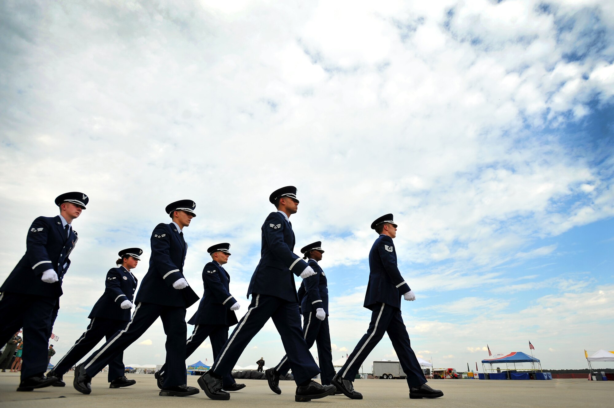 U.S. Air Force Airmen assigned to the Shaw Air Force Base Honor Guard, march into place during the execution of a retreat ceremony, May 4, 2012, Shaw Air Force Base, S.C. Shaw's Honor Guard conducted the retreat ceremony at the end of the first day of Shaw's Air Expo. More than 80 Airmen assigned to the 20th Fighter Wing, including the 20th FW Commander Col. Clay Hall, stood in formation for the retreat. (U.S. Air Force photo by Senior Airman Kenny Holston/Released)



