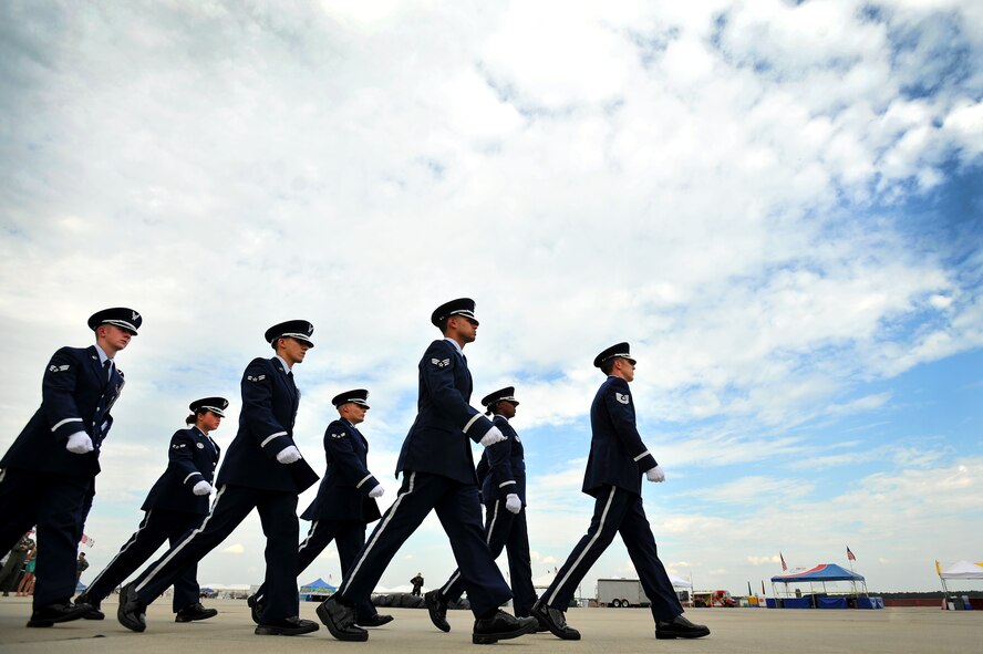U.S. Air Force Airmen assigned to the Shaw Air Force Base Honor Guard, march into place during the execution of a retreat ceremony, May 4, 2012, Shaw Air Force Base, S.C. Shaw's Honor Guard conducted the retreat ceremony at the end of the first day of Shaw's Air Expo. More than 80 Airmen assigned to the 20th Fighter Wing, including the 20th FW Commander Col. Clay Hall, stood in formation for the retreat. (U.S. Air Force photo by Senior Airman Kenny Holston/Released)


