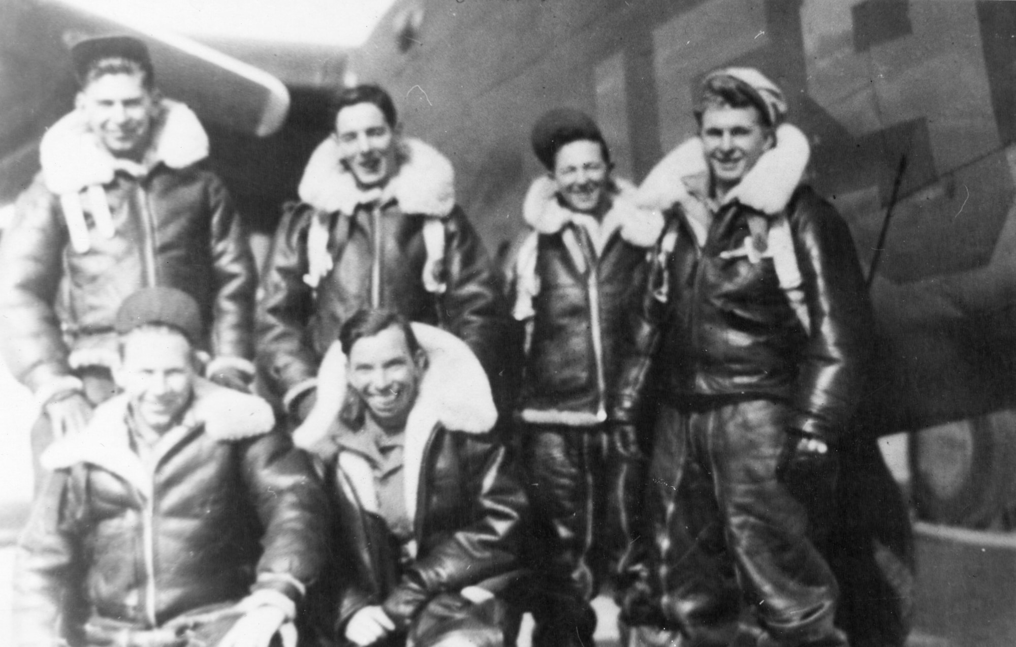 John D. Foley “Johnny Zero” (center, kneeling) and other crew members of Martin B-26 Marauder, 19th Bomb Squadron. Southwest Pacific. (U.S. Air Force photo).