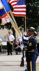 A Vietnam veteran salutes the flag during the playing of the national anthem during the Vietnam Veterans Memorial ceremony in San Antonio, Texas April 29. (U.S. Air Force Photo by Don Lindsey)