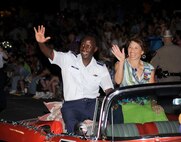 Gen.  Edward A. Rice Jr., Air Education and Training Command commander, and his wife, Teresa, ride in the 2012 Fiesta Flambeau Parade in San Antonio, Texas April 28. (U.S. Air Force Photo by Don Lindsey)