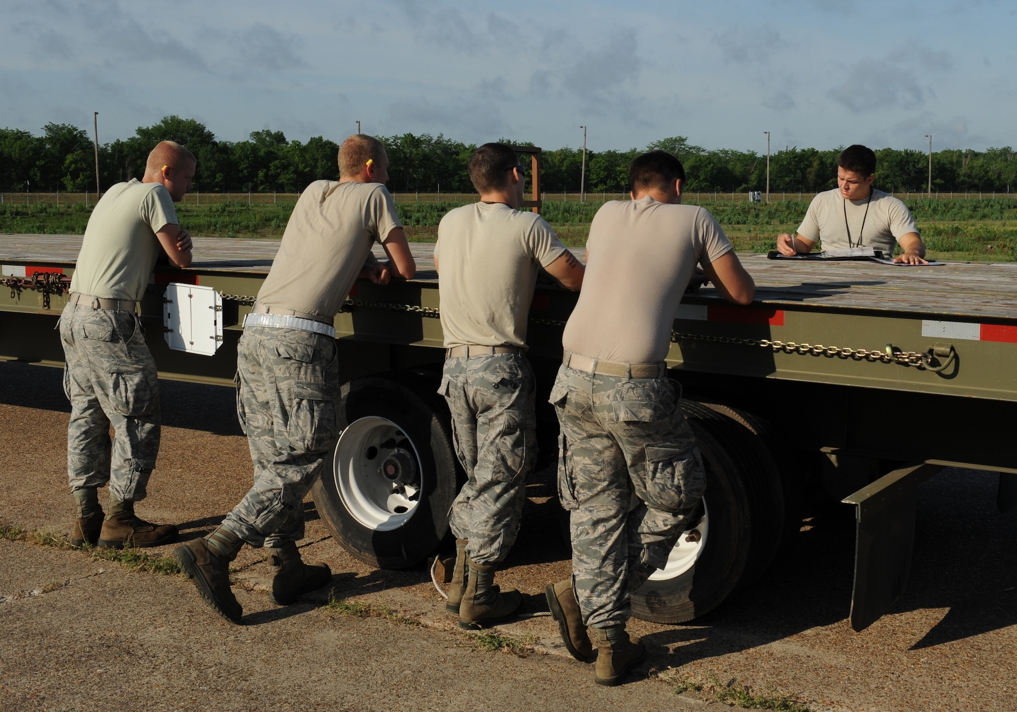 Staff Sgt. Chris Howard, 2nd Munitions Squadron storage and handling, briefs a team of 2 MUNS Airmen prior to an exercise on Barksdale Air Force Base, La., May 4. The 2 MUNS storage and handling unit is responsible for transporting and storing munitions. (U.S. Air Force photo/Airman 1st Class Benjamin Gonsier)(RELEASED) 