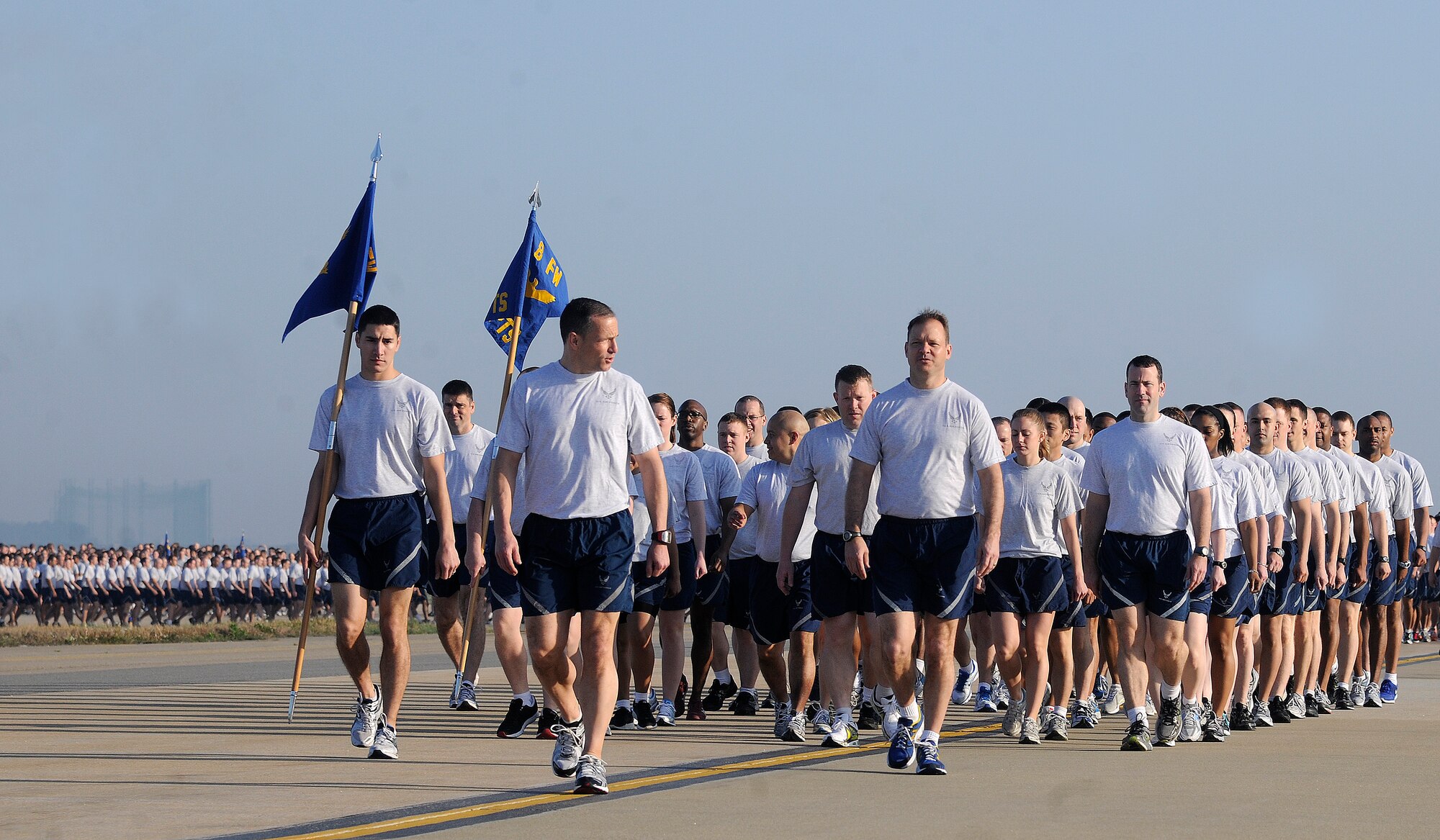 Wolf Pack Airmen line up in a formation to begin their early morning Warrior Run on Kunsan Air Base, Republic of Korea, May 4, 2012. Members of the 8th Fighter Wing kicked off their Post-CUI Block Party with an early morning run down the flightline. (U.S. Air Force photo/Staff Sgt. Rasheen A. Douglas)