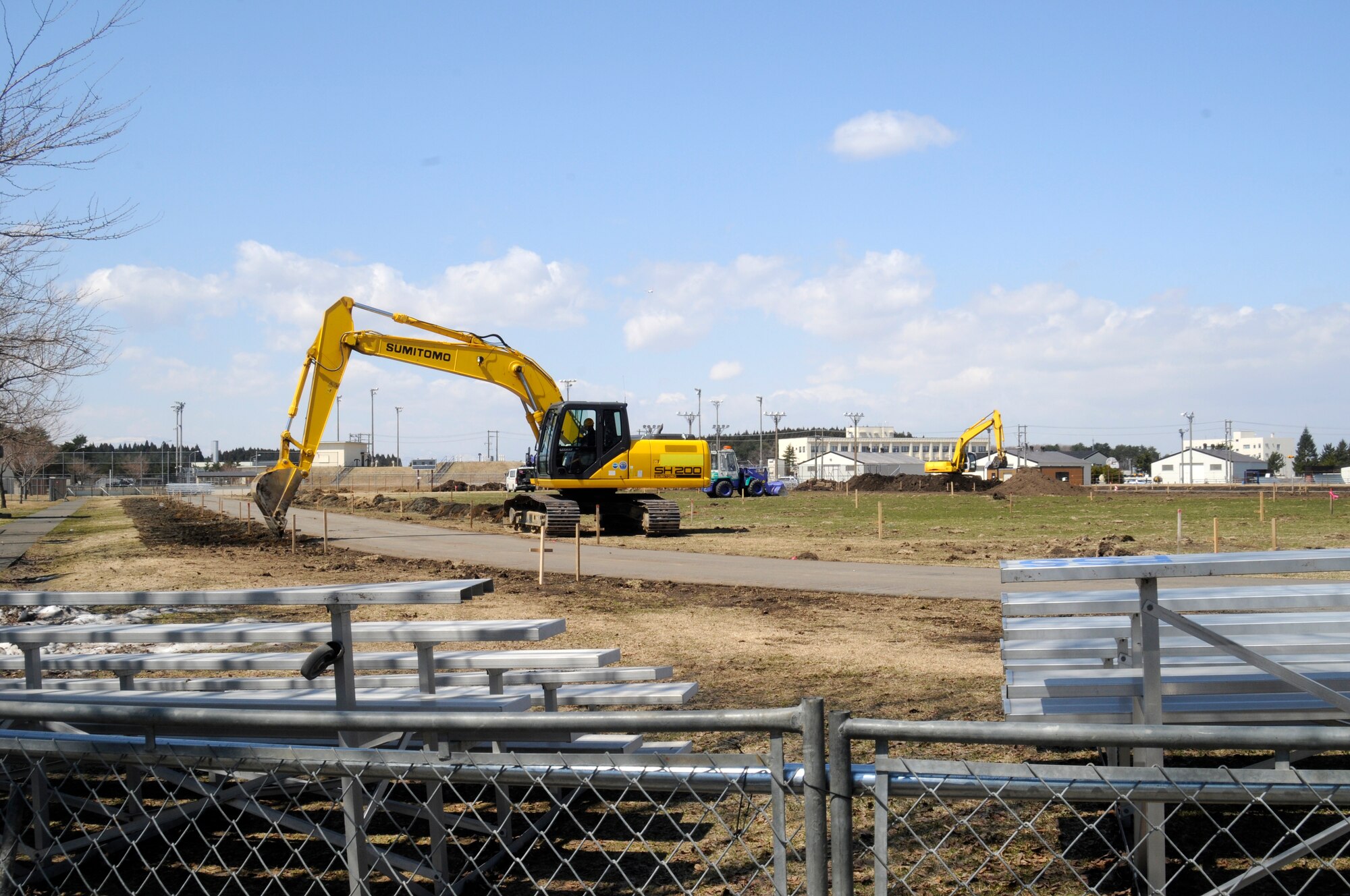 The 35th Civil Engineer Squadron works on renovations to the track and field near Edgren High School at Misawa Air Base, Japan, April 14, 2012. The project started March 16, 2012 and is scheduled to be completed by October 2012. Renovations include demolishing the old field and expanding the running track. (U.S. Air Force photo by Airman 1st Class Zachary Kee/Released)