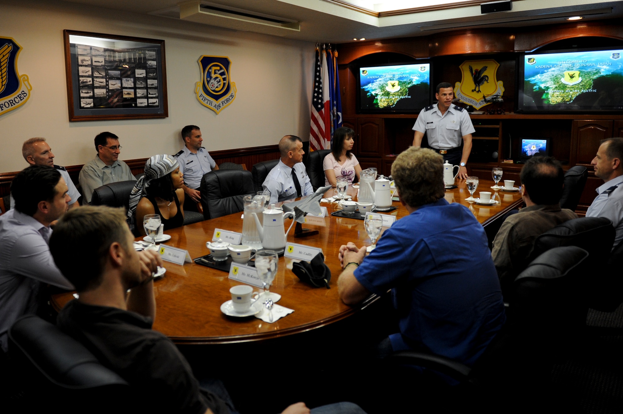U.S. Air Force Brig. Gen. Matthew Molloy, 18th Wing commander, hosts  a mission briefing for some of the cast members of TNT’s “Southland” and CBS’s “The Big Bang Theory” on Kadena Air Base, Japan, May 7, 2012. The cast members are on a United Service Organizations (USO) tour throughout Japan . (U.S. Air Force photo/Airman 1st Class Brooke P. Beers)