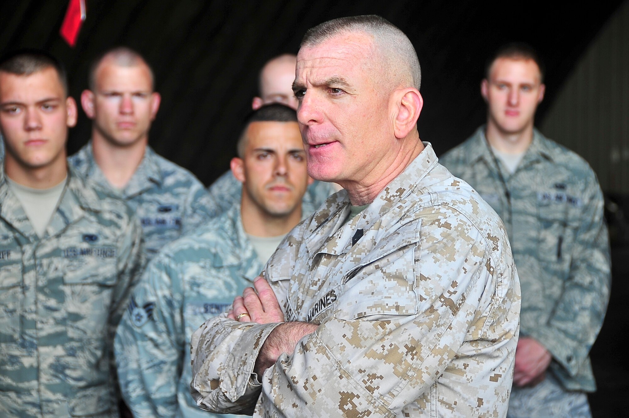 Marine Corps Sgt. Maj. Bryan Battaglia, Senior Enlisted Advisor to the Chairman of the Joint Chiefs of Staff, speaks with Airmen during a trip to Osan Air Base, Republic of Korea, May 3, 2012. Throughout his tour, Battaglia expressed the importance of the “U.S ROK relationship” and the role that Osan plays in the overall mission of U.S. Forces Korea. (U.S. Air Force photo/Senior Airman Adam Grant)          