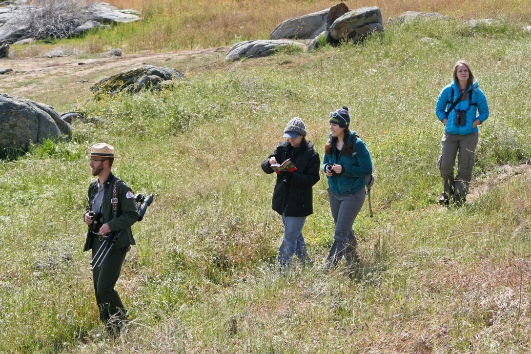 An enthusiastic group of birdwatchers heads out for an afternoon at Eastman Lake.