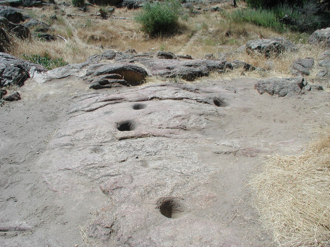 Mortars used by native Americans to grind grain for food can be seen at Stanislaus River Parks.