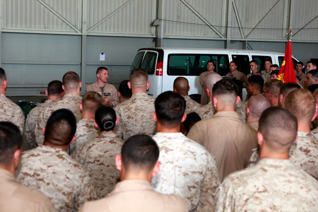 Lieutenant Col. Ned M. Biehl, commanding officer, Marine Medium Helicopter Squadron 364, 15th Marine Expeditionary Unit, gives a welcome aboard brief to his Marines and sailors shortly after their arrival, here, May 7. The exercise is designed to integrate the Aviation Combat Element, the Command Element and the Maritime Raid Force. 15th MEU is currently preparing for its deployment scheduled for this fall.