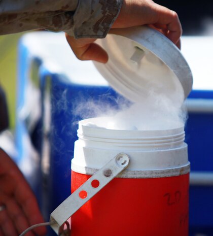 Petty Officer 3rd Class Charles A. Hill, a preventive medicine technician with the Preventive Medicine Unit, 2nd Marine Logistics Group, packs a trap with carbon dioxide aboard Camp Lejeune, N.C., May 8, 2012. Throughout the year, PMU performs many tasks to keep the living conditions on base at a high standard. The unit is now working hard as the summer months approach to catch and test mosquitoes from across the base for malaria. (U.S. Marine Corps photo by Pfc. Franklin E. Mercado)