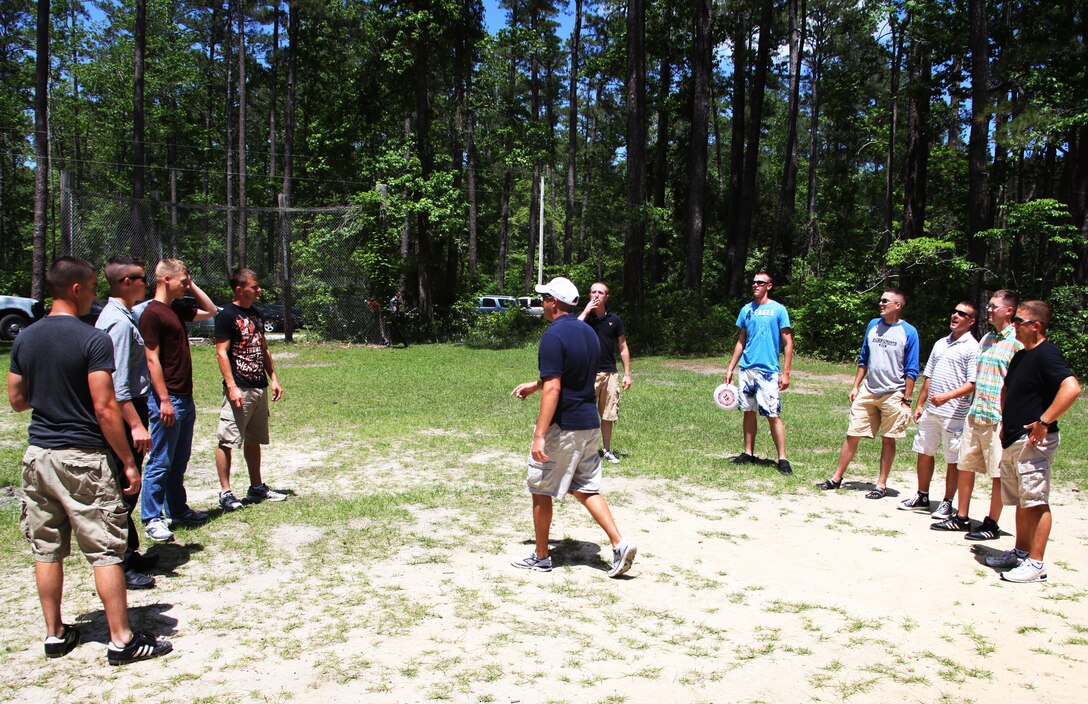 Marines of the 2nd Marine Aircraft Wing Band pick teams for a game of Ultimate Frisbee at MCAS Cherry Point, N.C., during a picnic thrown in honor of Maj. Gen. Jon M. Davis' nearly two years in command of the 2nd Marine Aircraft Wing, May 8. Under his command, 2nd MAW took part in Operation Enduring Freedom, Operation Odyssey Dawn and many other operational commitments around the globe.