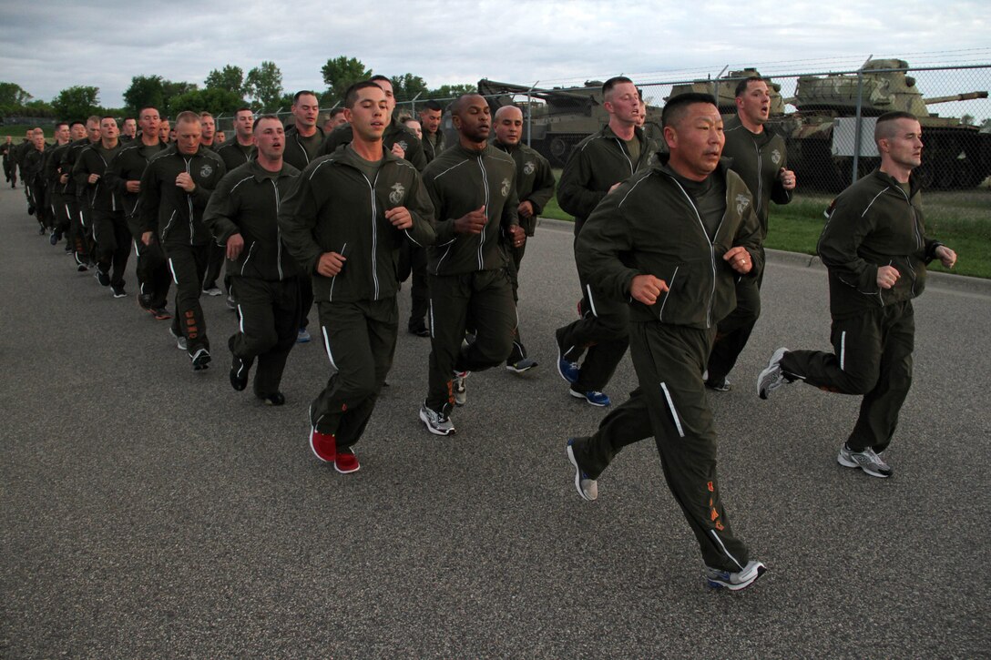 Brig. Gen. Daniel D. Yoo, commanding general of Western Recruiting Region and Marine Corps Recruit Depot San Diego, and Recruiting Station Twin Cities Commanding Officer Maj. Kenneth Gawronski lead a platoon of recruiters and headquarters personnel on a moto run May 8. Their morning workout also involved a series of CrossFit exercises. For additional imagery from the event, visit www.facebook.com/rstwincities.