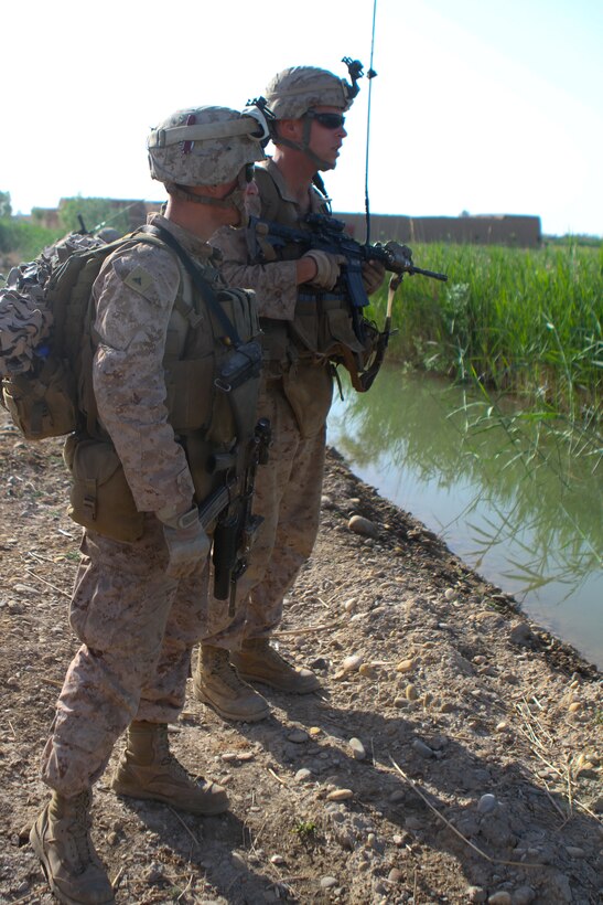 Lance Cpl. Adrian Delafuente, a rifleman with Black Sea Rotational Force 12 takes part in dismounted patrol training with Romanian soldiers in Iasi, Romania May 8. The ten-day event included training led by Marine non-commisioned officers. The Black Sea Rotational Force 12 is a Special-Purpose MAGTF with crisis response capabilities deployed to the region to enhance interoperability, promote regional stability and build camaraderie amongst the forces.::r::::n::(Official U.S. Marine Corps photo by Cpl. Paul D. Zellner II)::r::::n::