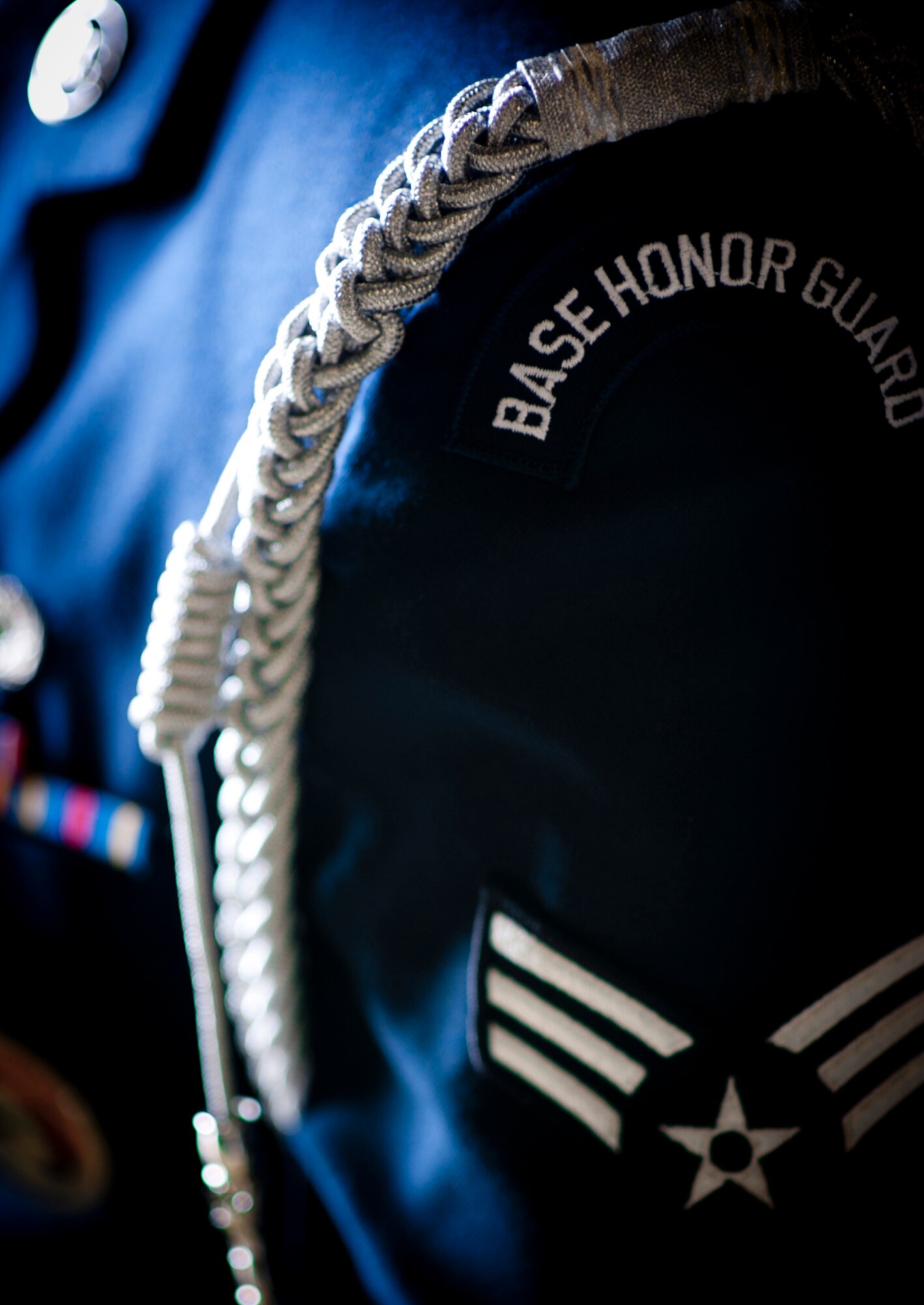 YOKOTA AIR BASE, Japan -- A base honor guard patch adorns a ceremonial uniform of a guardsman at Yokota Air Base, Japan, May 4, 2012. (U.S. Air Force photo by Staff Sgt. Samuel Morse)
