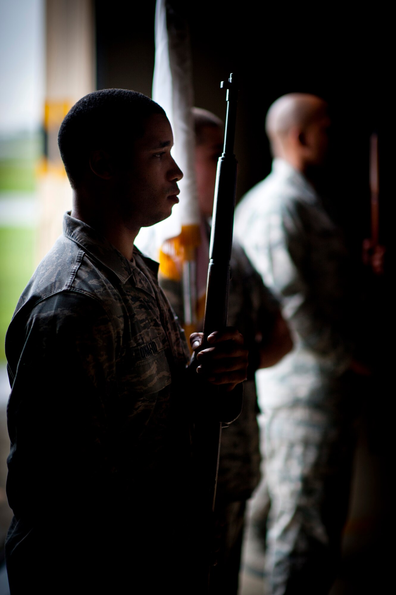 YOKOTA AIR BASE, Japan -- Staff Sgt. Jarrod Leonard, Yokota Honor Guardsman, holds a rifle at the position of port arms during a training session at Yokota Air Base, Japan, May 3, 2012. (U.S. Air Force photo by Staff Sgt. Samuel Morse)