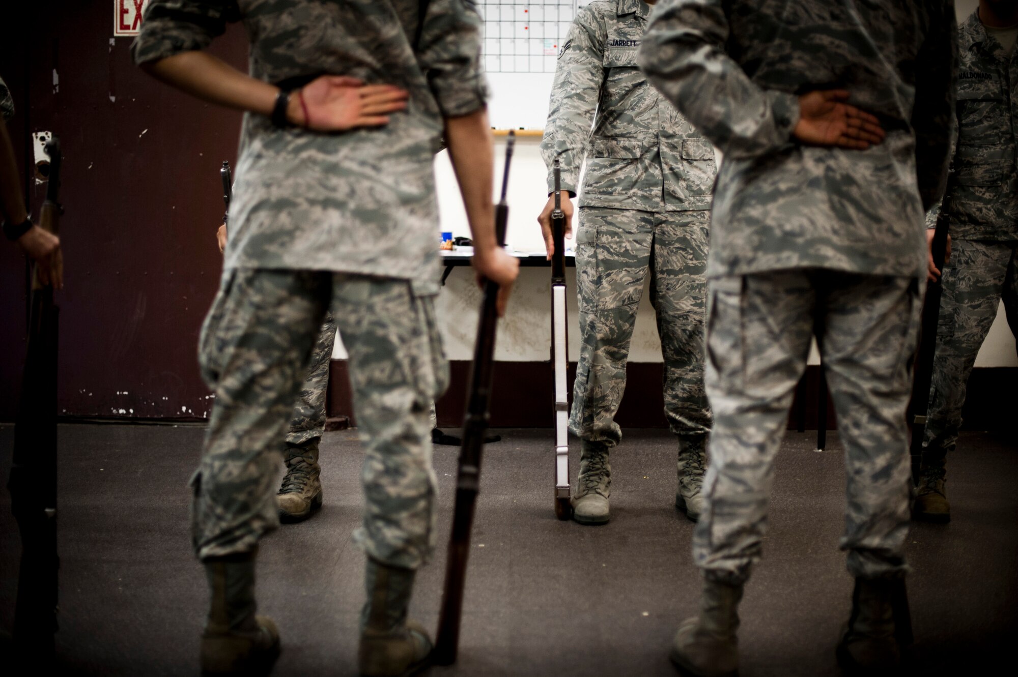 YOKOTA AIR BASE, Japan ? Yokota Honor Guard recruits learn how to perform facing movements and standing positions while carrying rifles during training at Yokota Air Base, Japan, on May 1, 2012. (U.S. Air Force photo by Staff Sgt. Samuel Morse)