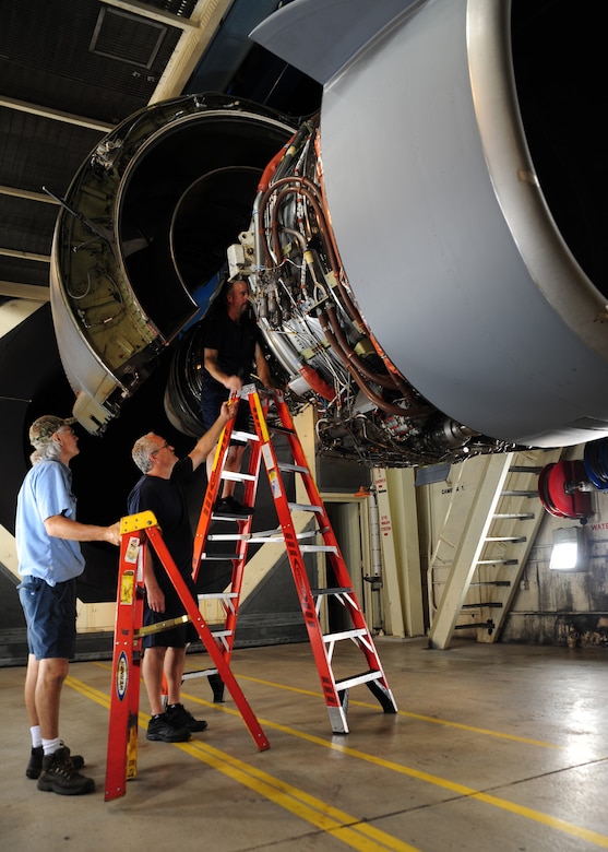 Aviation maintenance technicians work on a C-17 Globemaster III engine at the Joint Base Charleston – Air Base engine test cell building May 3. The all-civilian engine shop installs, inspects and repairs five to six engines a month. (U.S. Air Force photo/Staff Sergeant Katie Gieratz)