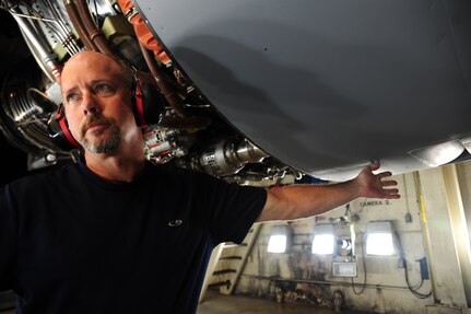 Tim Gorman performs an anti-ice check on a C-17 Globemaster III engine at the engine test cell at Joint Base Charleston – Air Base May 3. The wire is connected to ensure temperature is regulated in the engine. Goreman is an aviation maintenance technician with United Airlines. (U.S. Air Force photo/Staff Sergeant Katie Gieratz)