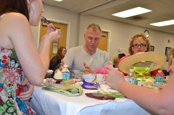 Terry Serpico has tea with military spouses at the Joint Base Charleston - Air Base Airman and Family Readiness Center, May 5. Serpico is an actor on Lifetime Network's television series, "Army Wives" and for the last five seasons has played the role of Army Lt. Col. Frank Sherwood. The spouses were being honored as part of Military Spouse Appreciation Day which included massages, hair styling salon, tea and other events. The sixth season of "Army Wives" premiered May 1 on the Lifetime Network and the majority of the show is filmed in North Charleston, S.C. (U.S. Air Force Photo / Airman 1st Class Tom Brading)