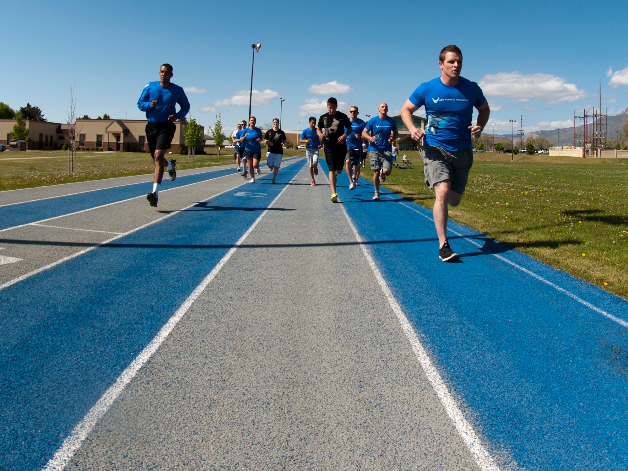 A group of new AF Reserve recruits begins a 1.5-mile run as part Development Training Flight activities here Saturday.  (U.S. Air Force photo/Staff Sgt. Kyle Brasier)