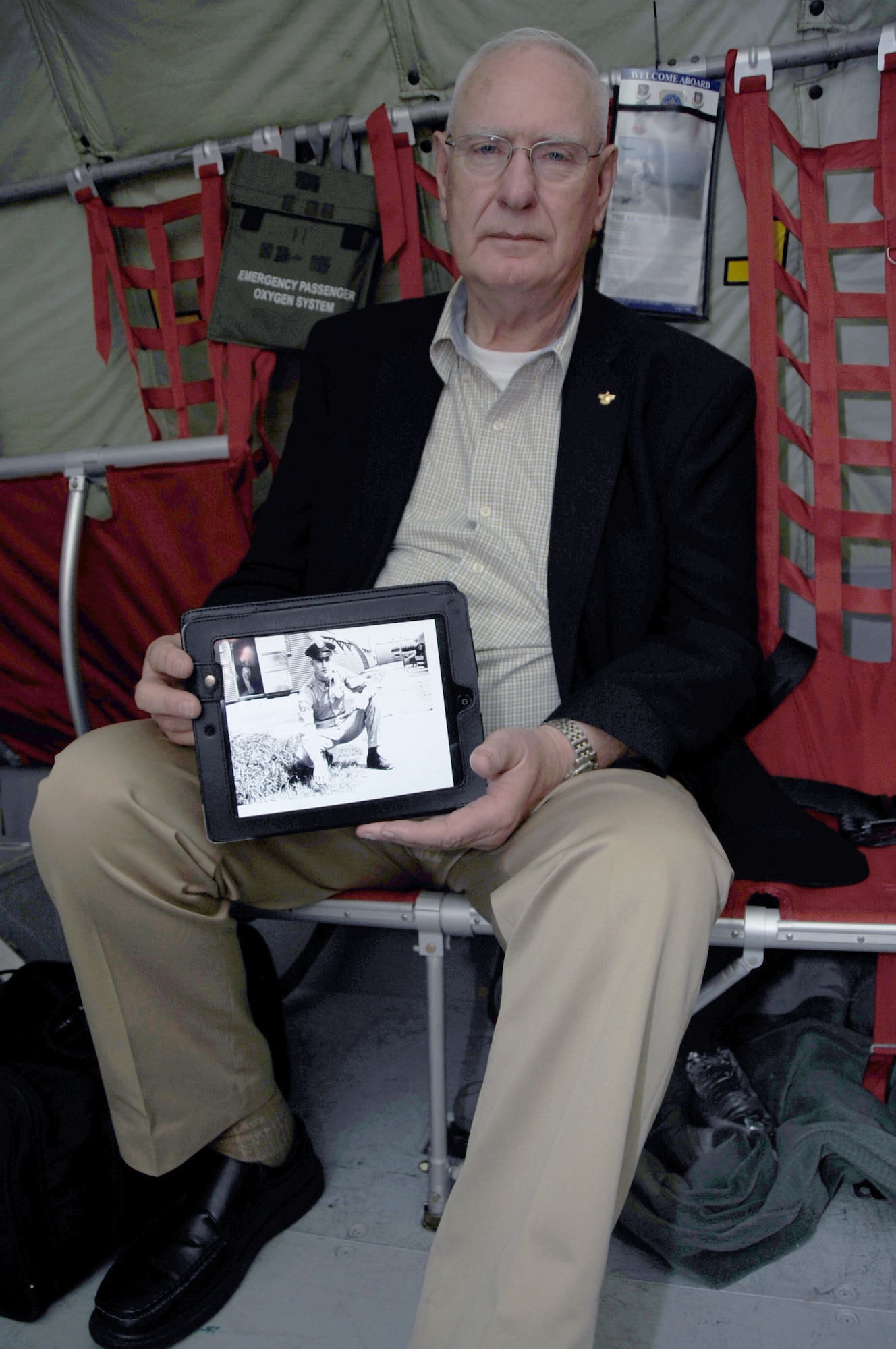 MACDILL AIR FORCE BASE, Fla. – Instead of carrying a wallet full of pictures, 87 year-old James Watland has kept up with the times.  He shows off a picture of himself on his computer these days.  Watland served in the Air Force from 1952-1962, and was one of the first to fly in the same type of aircraft he sits in today.  Watland had an opportunity to relive old memories during an orientation flight for employers and civic leaders hosted by the 927th Air Refueling Wing, a reserve unit at MacDill recently. (Official U.S. Air Force photo by Staff Sgt. Shawn Rhodes)