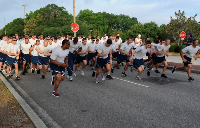 Airmen and Sailors from Joint Base Charleston participate in the Commander's Run on Joint Base Charleston - Air Base May 4. The Commander's Challenge is held monthly to test Team Charleston's fitness abilities. (U.S. Air Force photo/Airman 1st Class Ashlee Galloway)