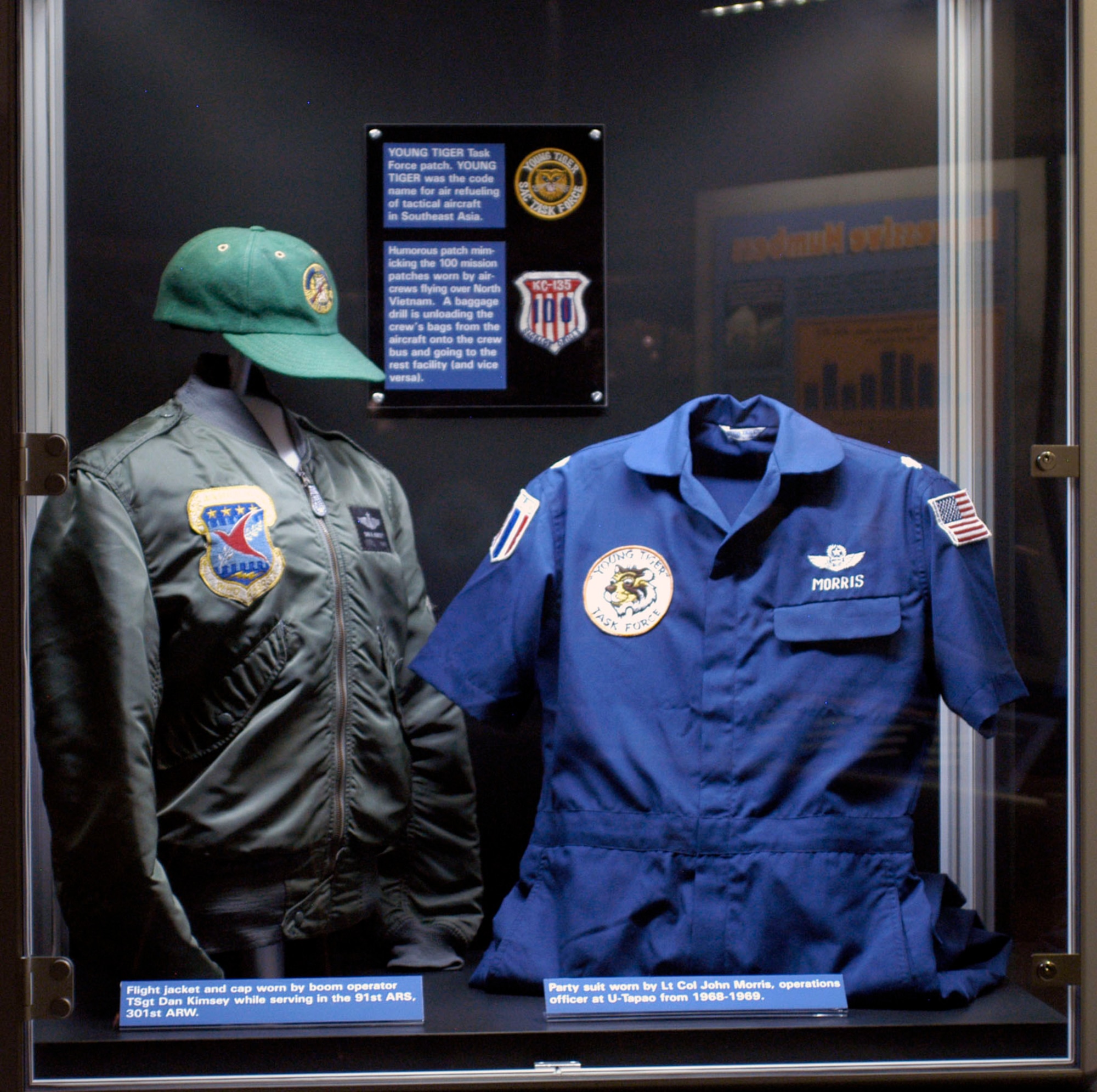 DAYTON, Ohio -- The "Tankers at War: Air Refueling in Southeast Asia" exhibit in the Southeast Asia War Gallery at the National Museum of the U.S. Air Force includes a flight jacket and cap worn by boom operator Tech. Sgt. Dan Kimsey, who served with the 91st Air Refueling Squadron, as well as a party suit worn by Lt. Col. John Morris, the operations officer at U-Tapao from 1968-1969. (U.S. Air Force photo)
