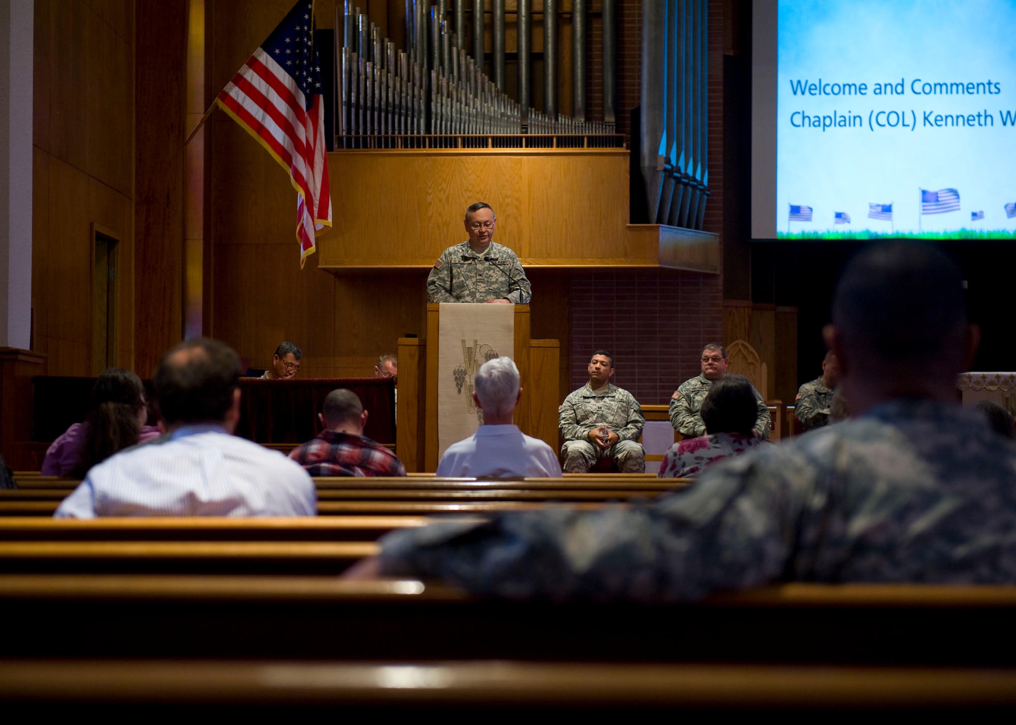 U.S. Army Chap. (Col.) Kenneth Bush, 633rd Air Base Wing deputy chaplain, speaks to the congregation about praying as a community during the National Day of Prayer celebration at the Regimental Memorial Chapel at Fort Eustis, Va., May 3, 2012. In April 1952, then-President Harry S. Truman signed a bill proclaiming the president must declare a National Day of Prayer annually. (U.S. Air Force photo by Senior Airman John D. Strong II/Released)