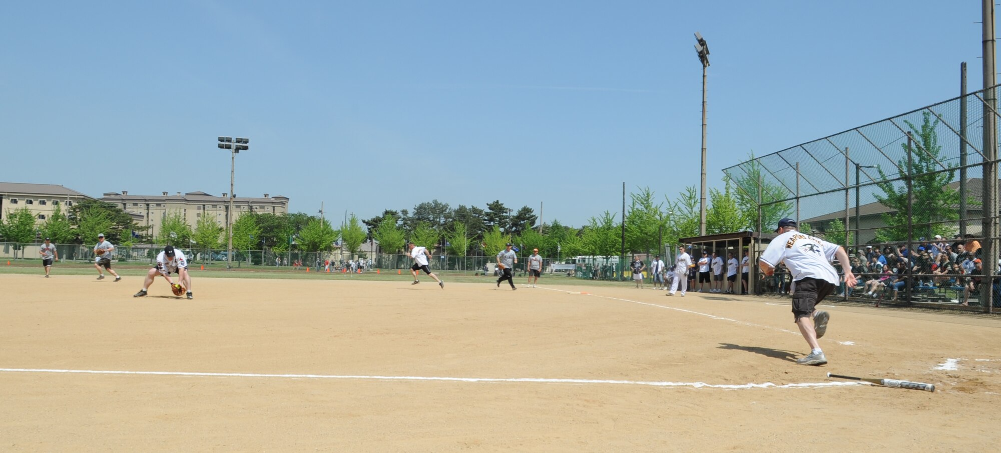 Chief master sergeants and colonels from the 8th Fighter Wing play for bragging rights during the Chiefs vs. Eagles softball game May 4, 2012, on Kunsan Air Base, Republic of Korea. Although the colonels started out strongly, the chiefs took the lead and won 27-7. (U.S. Air Force photo/Senior Airman Brigitte N. Brantley)