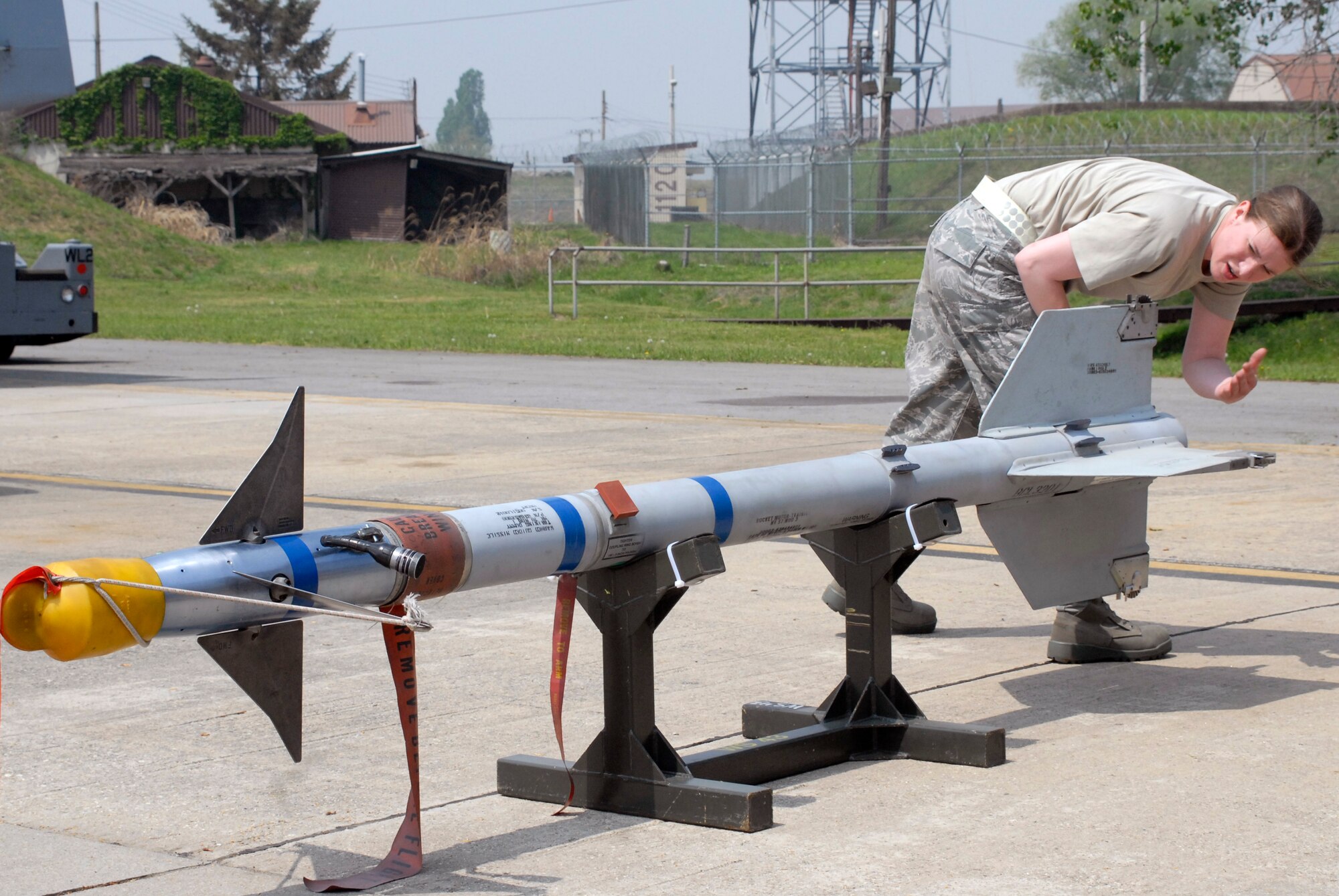 Senior Airman Kimberly Johnson, 80th Aircraft Maintenance Unit, inspects an AIM-9 missile during a weapons loading competition at Osan Air Base, Republic of Korea, May 5, 2012. (U.S. Air Force photo/Tech. Sgt. Eric Petosky)