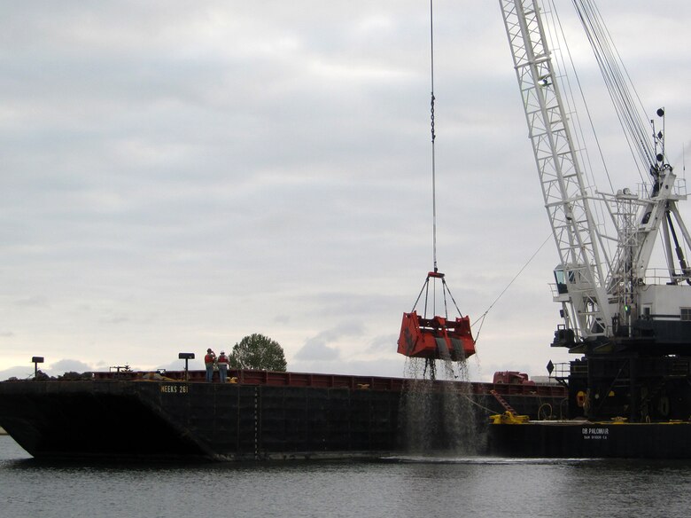 A clamshell dredge begins a five-month project May 2 to remove up to 350,000 cubic yards of material from the federal channel in Newport Harbor, Calif. The Port of Long Beach will use about one-third of the dredged material for its middle harbor redevelopment project.