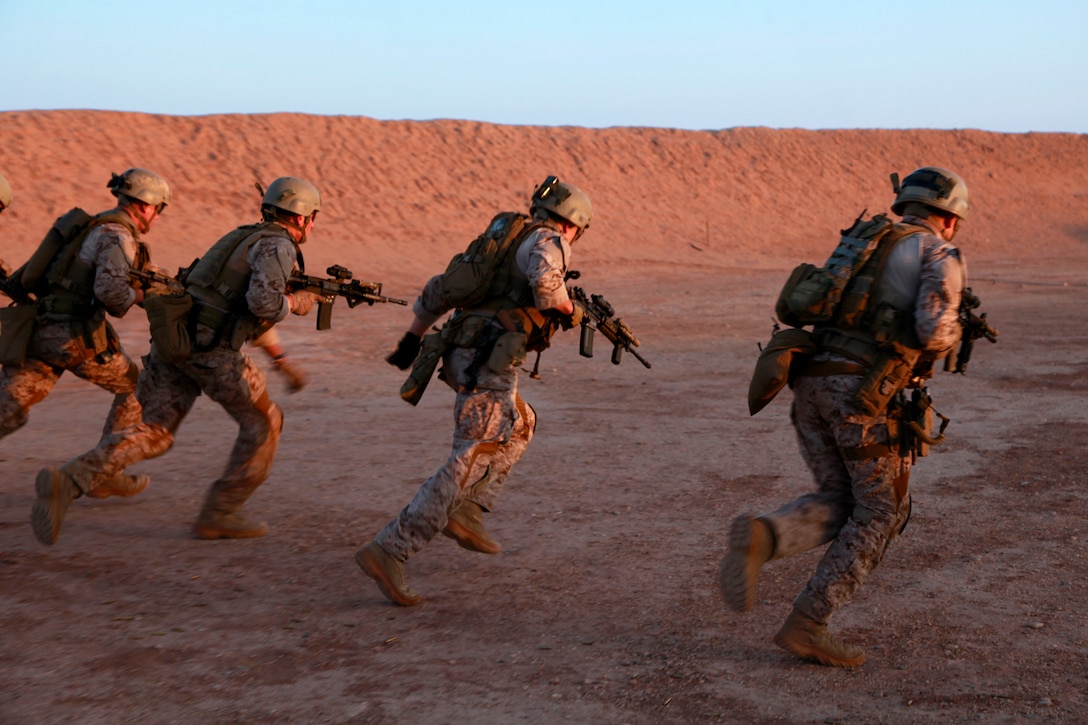 Force Reconnaissance Marines with the Assault Element, Maritime Raid Force, 15th Marine Expeditionary Unit, engage targets during a Special Operations Training Group live-fire qualification, May 8. The qualification involved shooting on the move from up to 50 yards away and for those armed with a pistol it included a weapons transition while closing in on a target. Additionally, it will lead to more in-depth exercises as the ground portion of Realistic Urban Training moves forward.