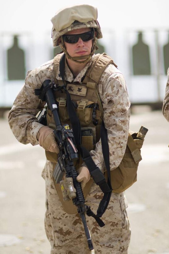 Petty Officer 3rd Class Andrew Richard faces away from targets during live-fire training aboard USS Pearl Harbor May 8. Richard hails from Lancaster, Calif., and serves as a corpsman with Battalion Landing Team 3/1, the ground combat element for the 11th Marine Expeditionary Unit. The unit embarked the ship, as well as USS Makin Island and USS New Orleans in San Diego Nov. 14, beginning a seven-month deployment to the Western Pacific, Horn of Africa and Middle East regions.