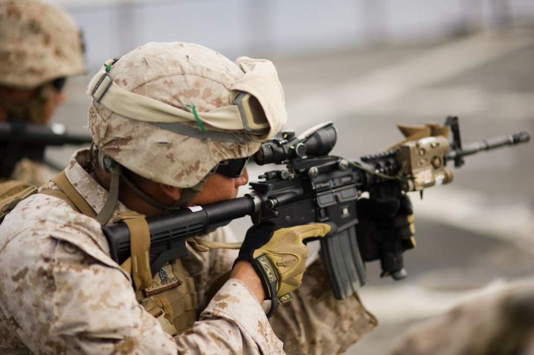 Sgt. Jacob Navarro fires an M4 carbine aboard USS Pearl Harbor May 8 during live-fire training. The Dallas native serves as a rifleman for Company K. The company is one of three rifle companies in Battalion Landing Team 3/1, the ground combat element for the 11th Marine Expeditionary Unit. The unit embarked the ship, as well as USS Makin Island and USS New Orleans in San Diego Nov. 14, beginning a seven-month deployment to the Western Pacific, Horn of Africa and Middle East regions.