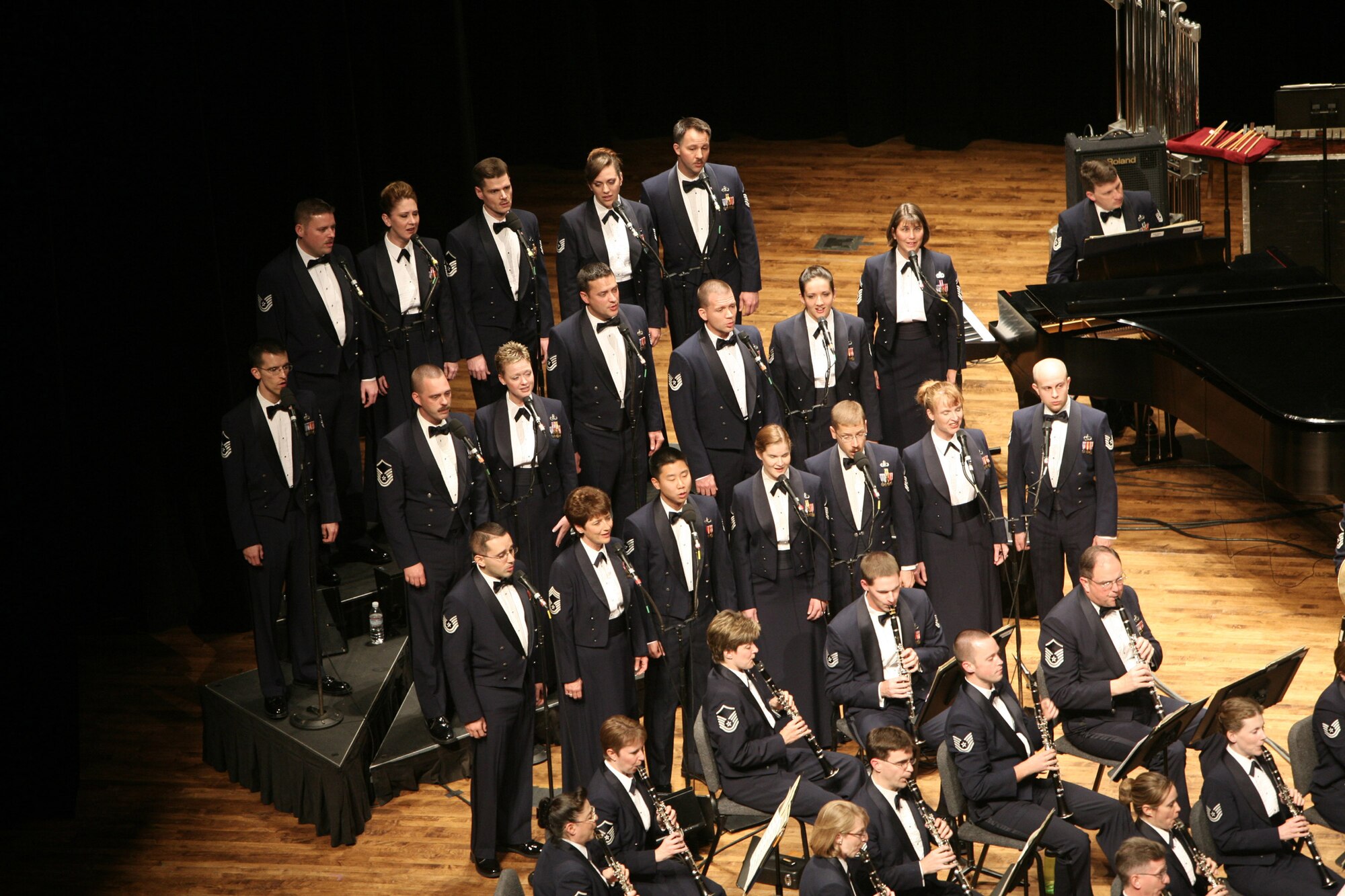 The U.S. Air Force Singing Sergeants and members of The Concert Band perform at an outreach concert. 