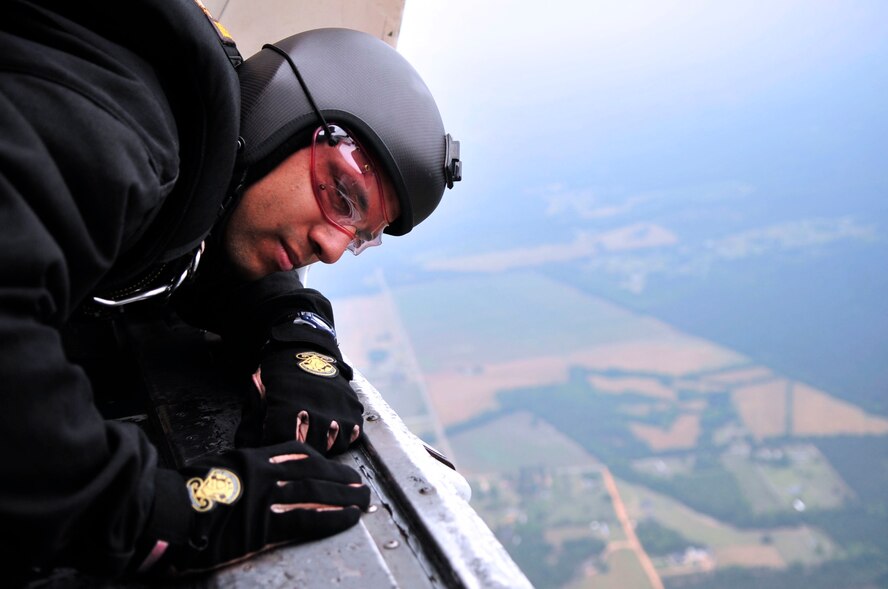 U.S. Army Sgt. David Echeverry, U.S. Army Parachute Team "Golden Knights" prepares for his jump at the Shaw Air Expo, Shaw Air Force Base, S.C., May 6, 2012.  The Golden Knights consists of two teams, the black team and the gold team, which travel across the U.S. performing at air shows and other competitions.(U.S. Air Force photo by Airman Nicole Sikorski/Released)