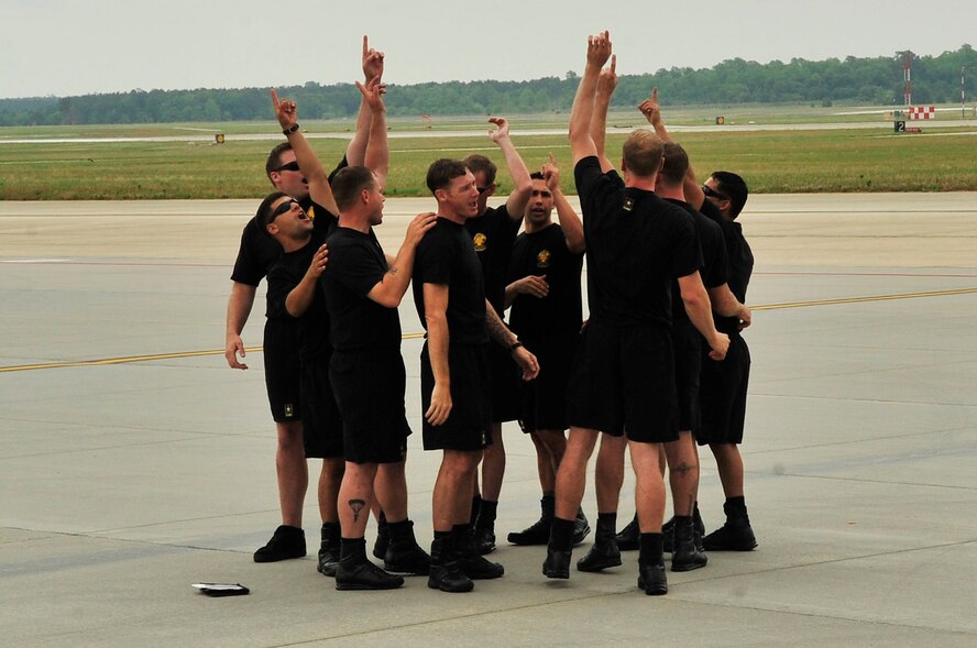 U.S. Army Parachute Team "Golden Knights" black team prepare for a jump demonstration at the Shaw Air Expo, Shaw Air Force Base, S.C., May 6, 2012.  The Golden Knights consists of two teams, the black team and the gold team, which travel across the U.S. performing at air shows and other competitions.(U.S. Air Force photo by Airman Nicole Sikorski/Released)