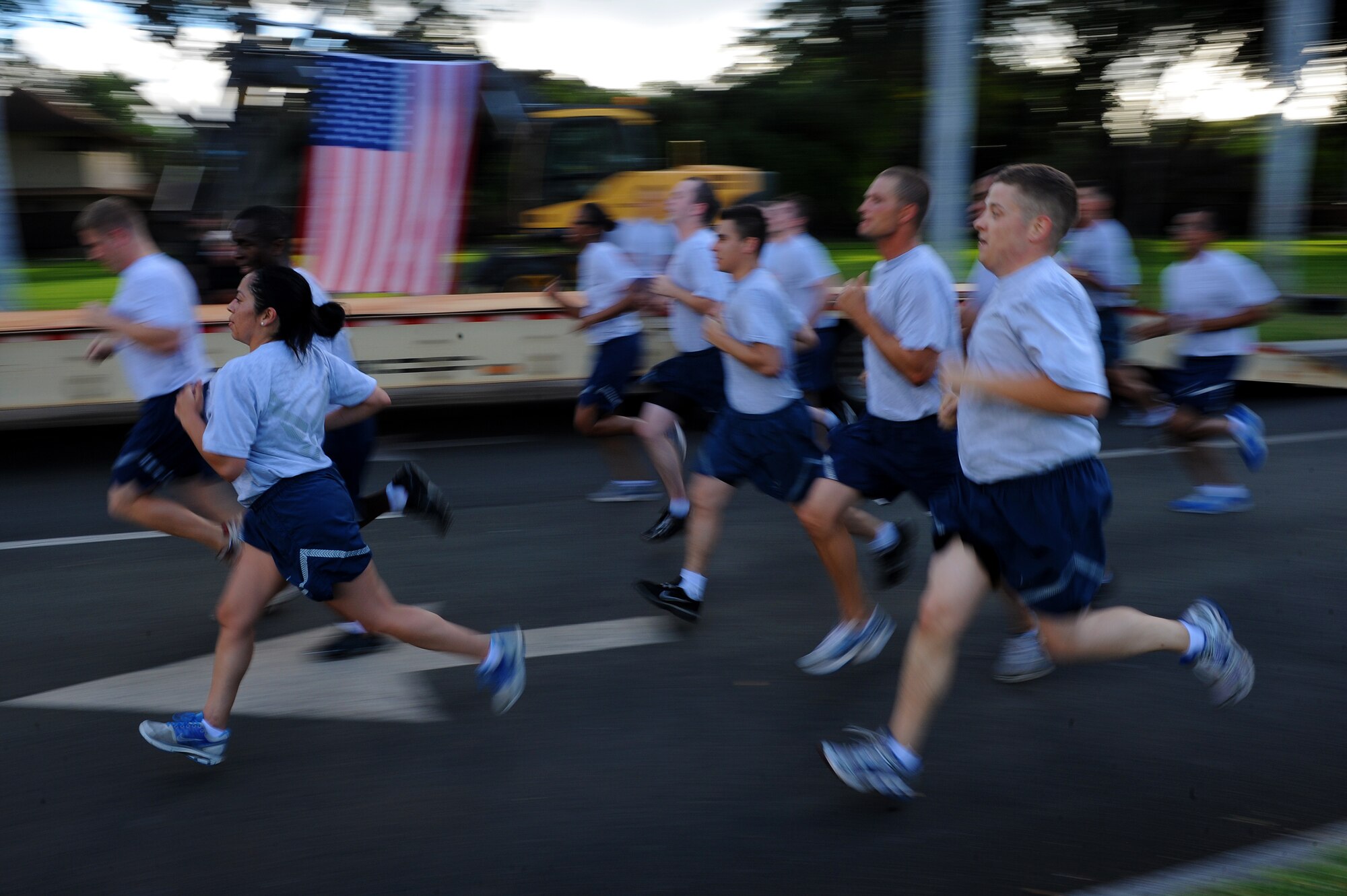 Airmen, Soldiers, Sailors and Marines stationed at Joint Base Pearl Harbor-Hickam, Hawaii, sprint the final leg of the two-mile Team Hickam Warrior Run May 3. This event was sponsored by the 647th Civil Engineers Squadron and their Prime BEEF Airmen. Prime BEEF, is a Prime Base Engineer Emergency Force is a rapidly deployable, specialized civil engineer unit of the Air Force Prime BEEFs provide a full range of engineering support required to establish, operate, and maintain garrison and contingency airbases. The Prime BEEF motto is "If you mess with the bull, you get the horns." (U.S. Air Force photo/Staff Sgt. Mike Meares)