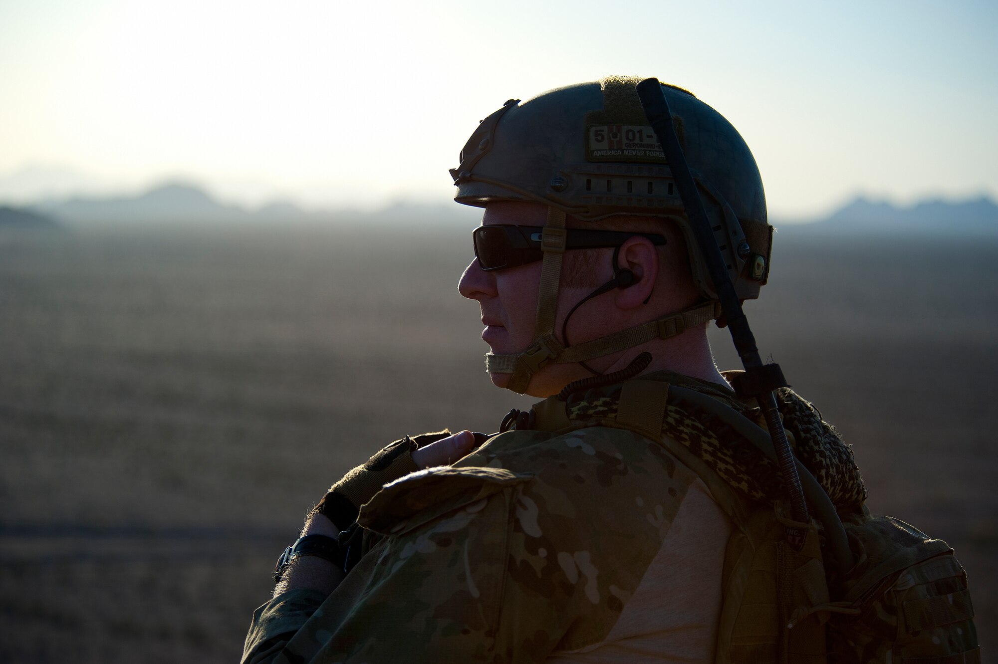 U.S. Air Force Staff Sgt. Jacob Torgerson, 116th Air Support Operations Squadron joint terminal attack controller, watches an airstrike he called in during the exercise at the Barry M. Goldwater Range Complex, Ariz., May 03, 2012. JTACs let the pilots know if the airstrike was successful or if they need to fly in to re-attack a target. (U.S. Air Force photo by Staff Sgt. Jason Colbert)
