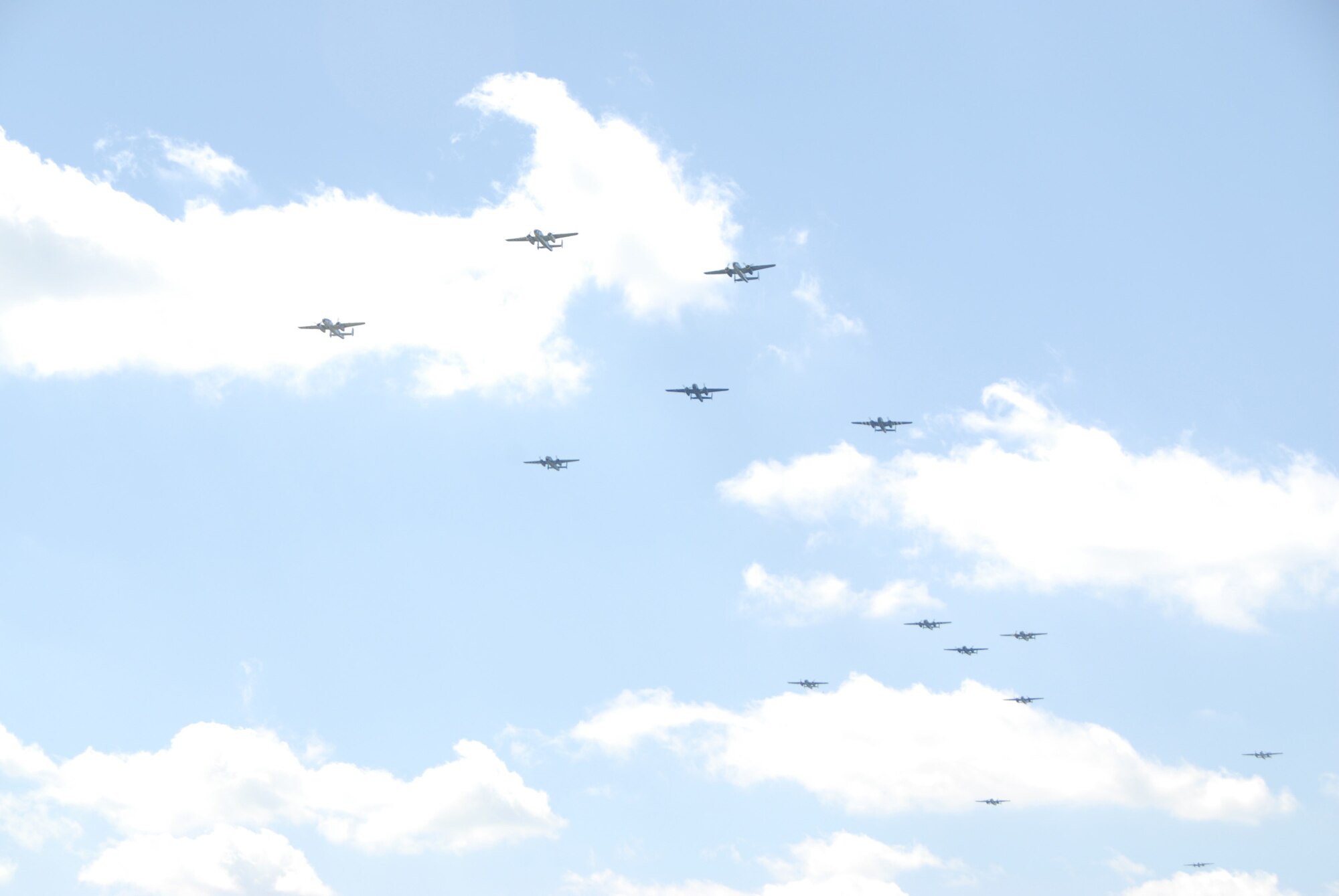 WRIGHT-PATTERSON AIR FORCE BASE, Ohio - The Doolittle Tokyo Raiders commemorated the 70th anniversary of the raid on Japan at a memorial service April 18, 2012, at the National Museum of the United States Air Force. The 20 vintage B-25 bombers performed a fly-by during the ceremony. (U.S. Air Force photo/Tech. Sgt. Anthony Springer) 
