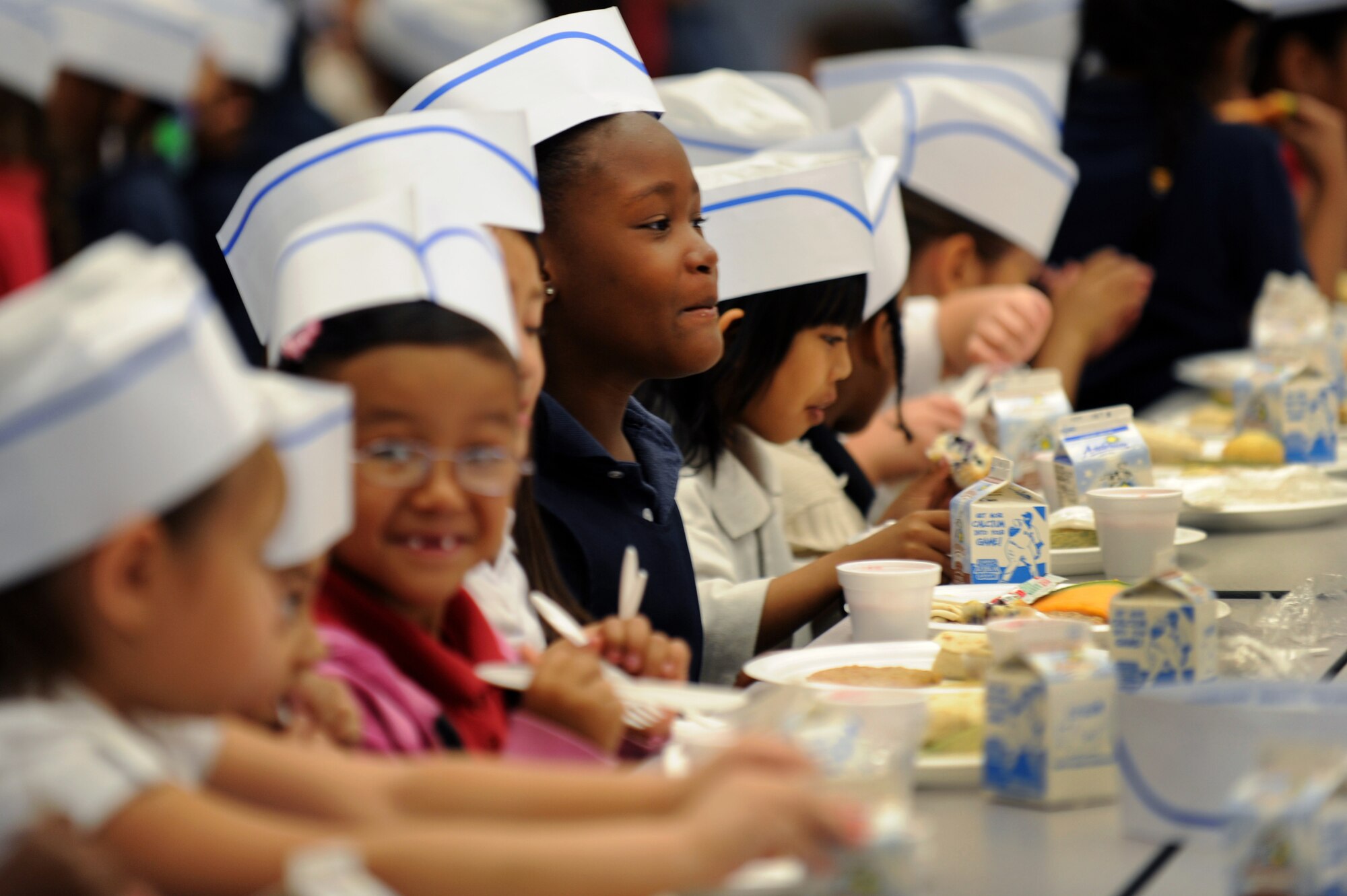 Children from Rex Bell Elementary School enjoy breakfast during a Chefs for Kids event May 3, 2012, in Las Vegas, Nev. Chefs for Kids serves about 9,000 breakfasts to children during each school year. (U.S. Air Force photo by Staff Sgt. William P.Coleman)
  

