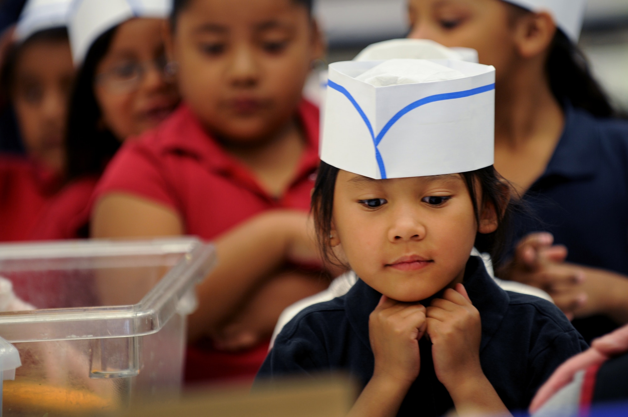 Children from Rex Bell Elementary School wait in line for breakfast with anticipation during a Chefs for Kids event, May 3, 2012, in Las Vegas, Nev. Chefs for Kids is dedicated to alleviating malnutrition and hunger in children through education and awareness. (U.S. Air Force photo by Staff Sgt. William P.Coleman)
  

